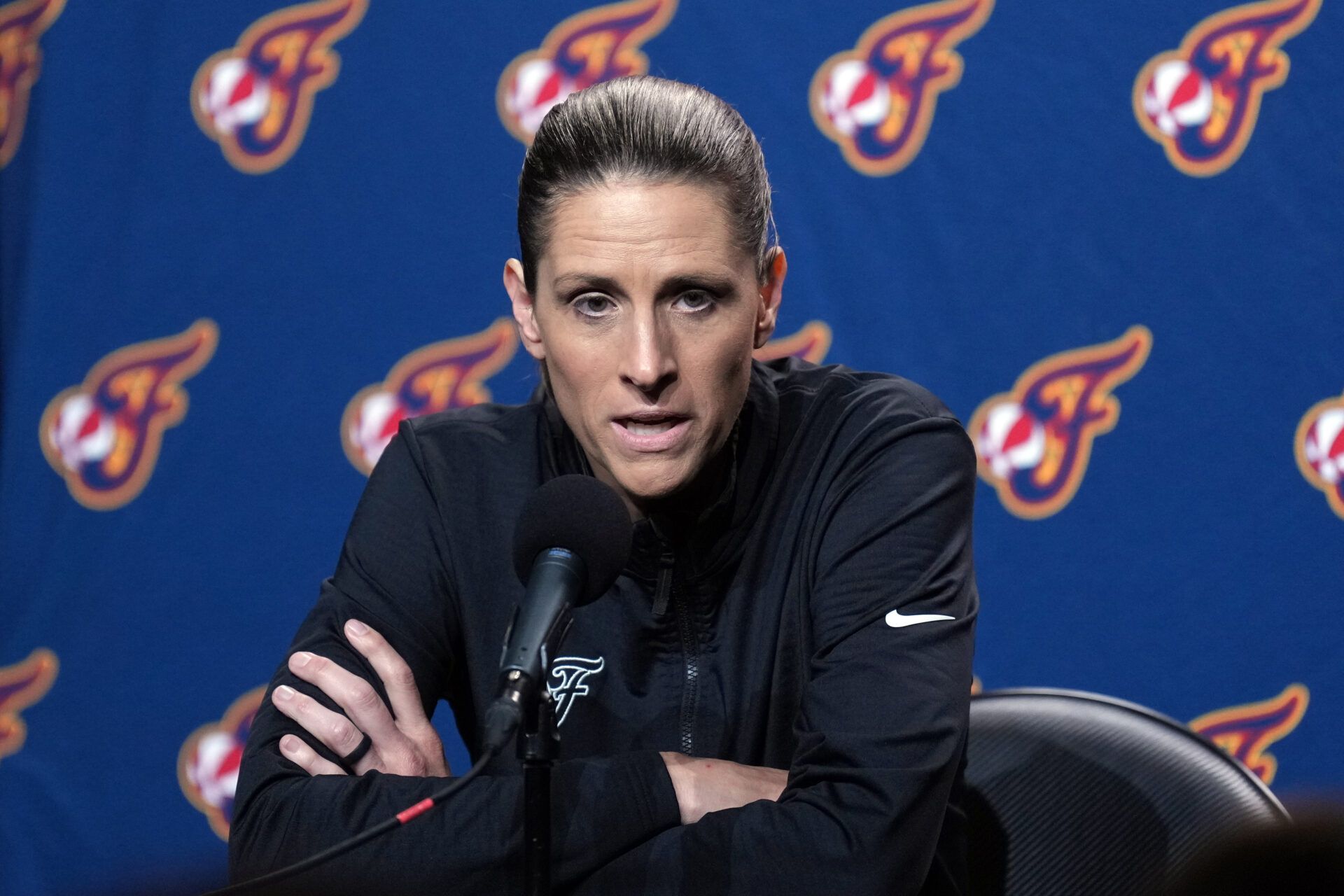Indiana Fever head coach Stephanie White talks to media members before the game against the Golden State Valkyries at Chase Center.