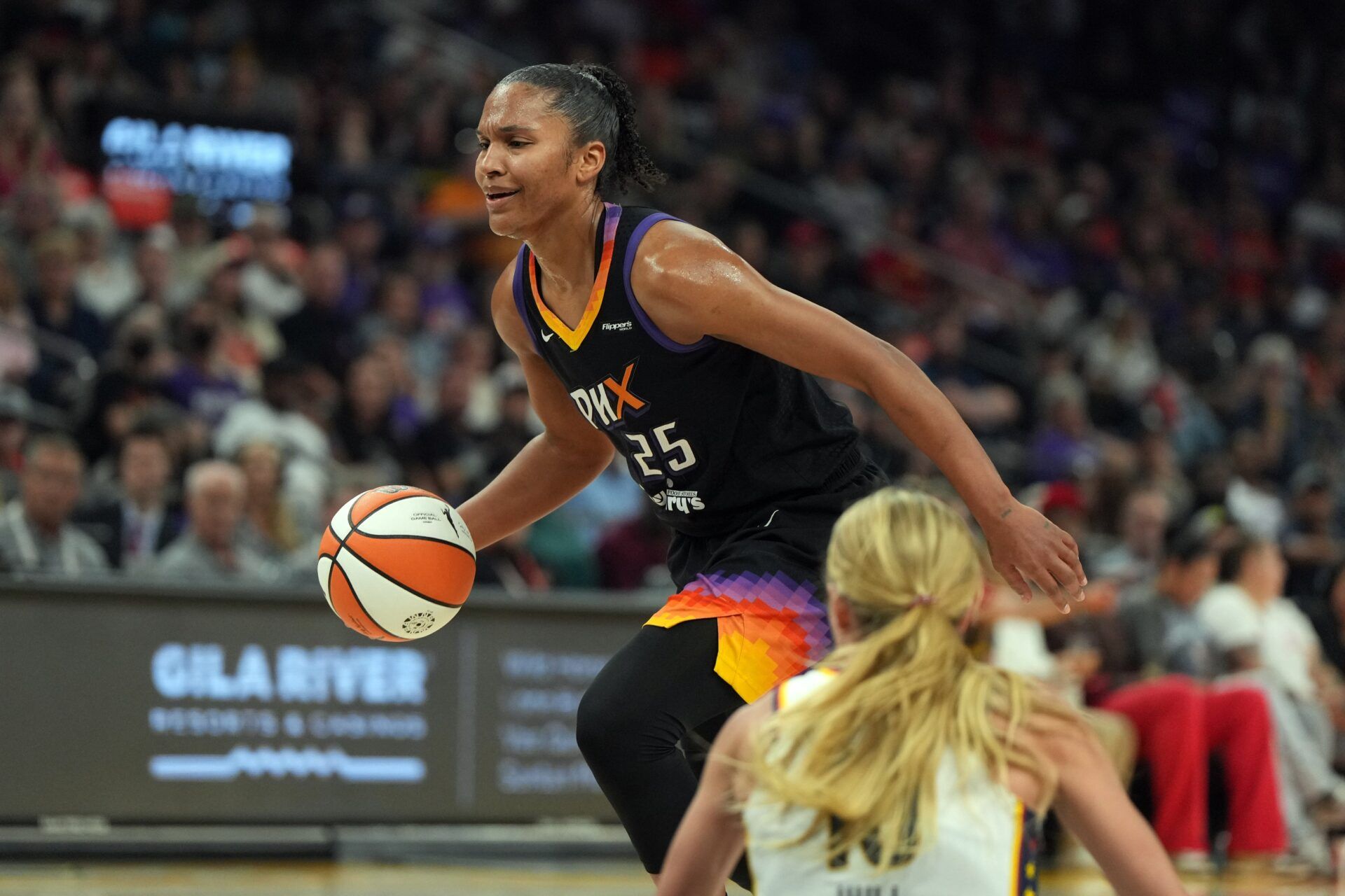 Phoenix Mercury forward Alyssa Thomas (25) drives past Indiana Fever guard Lexie Hull (10) in the first half at PHX Arena.