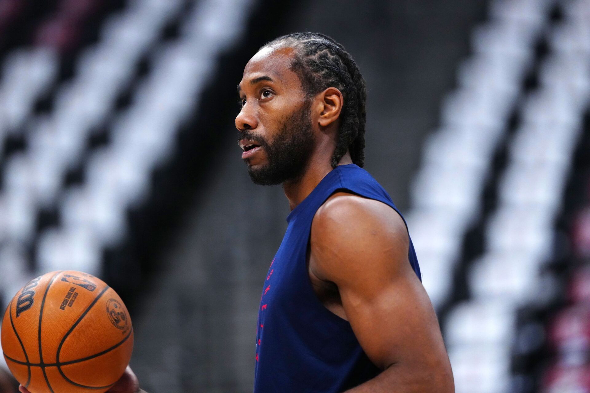 LA Clippers forward Kawhi Leonard (2) warms up before the game against the Denver Nuggets during game seven of first round for the 2025 NBA Playoffs at Ball Arena.