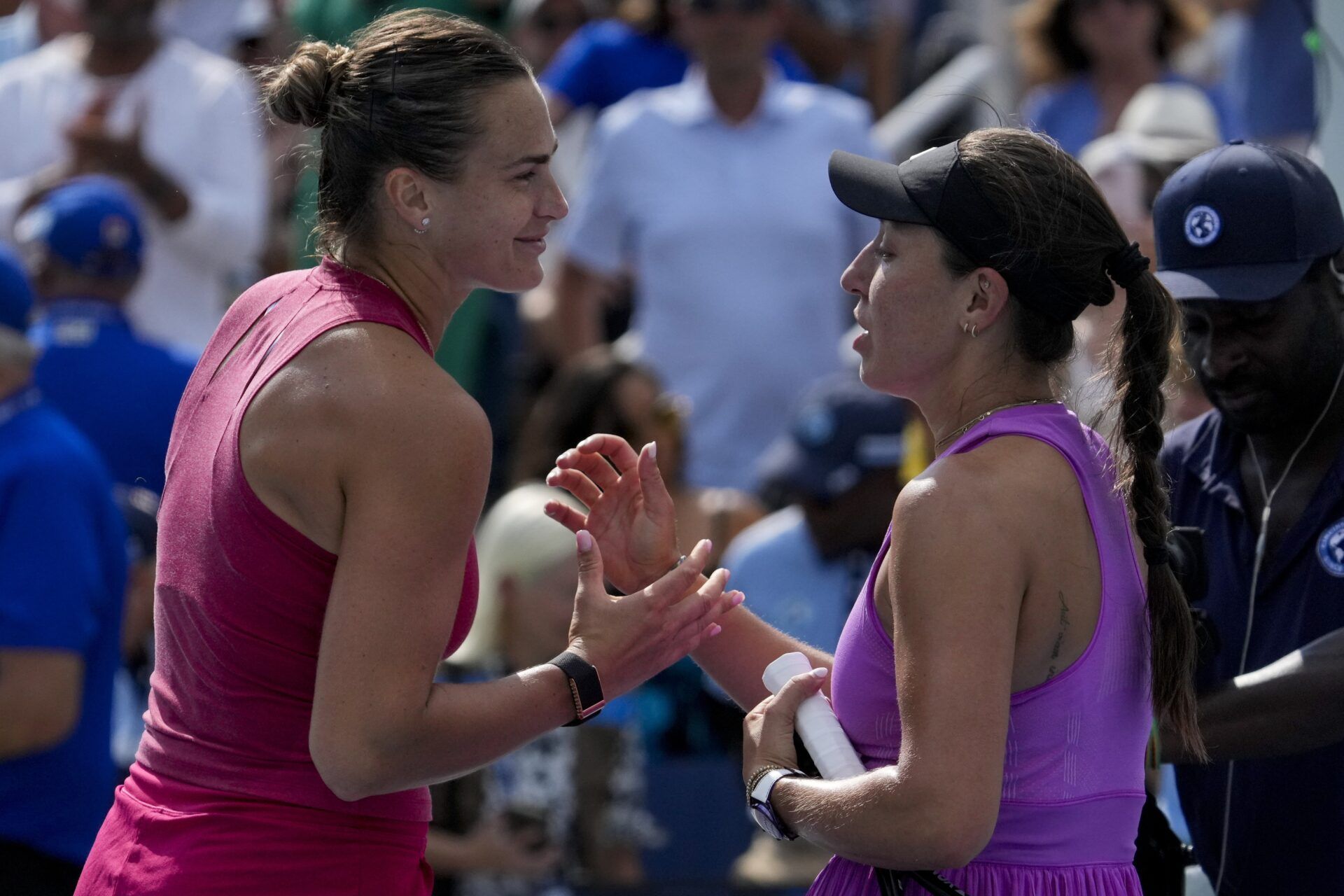 Aryna Sabalenka and Jessica Pegula shake hands after the final set of the womens championship match of the Cincinnati Open at the Lindner Family Tennis Center in Mason, Ohio, on Monday, Aug. 19, 2024. Aryna Sabalenka defeated Jessica Pegula in straight sets, 6-3, 7-5, for the championship.