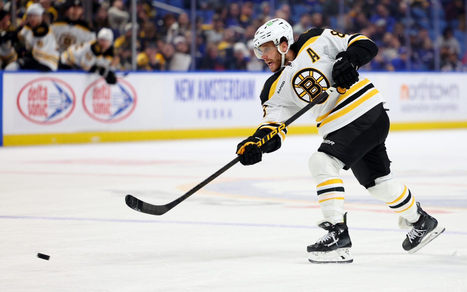Boston Bruins right wing David Pastrnak (88) takes a shot on goal during the third period against the Buffalo Sabres at KeyBank Center.