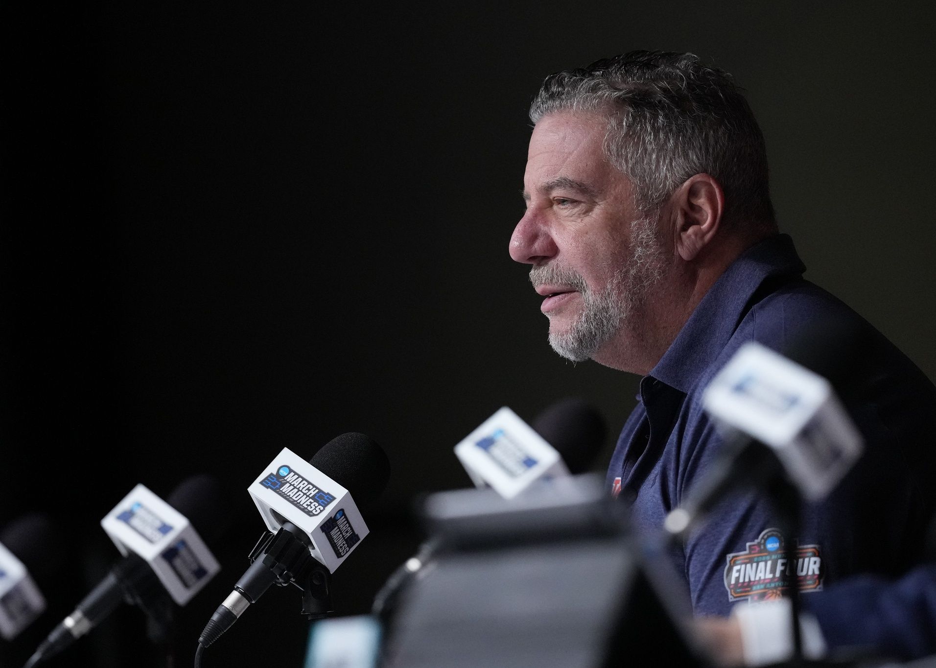 Auburn head coach Bruce Pearl talks to the media at the Alamodome.