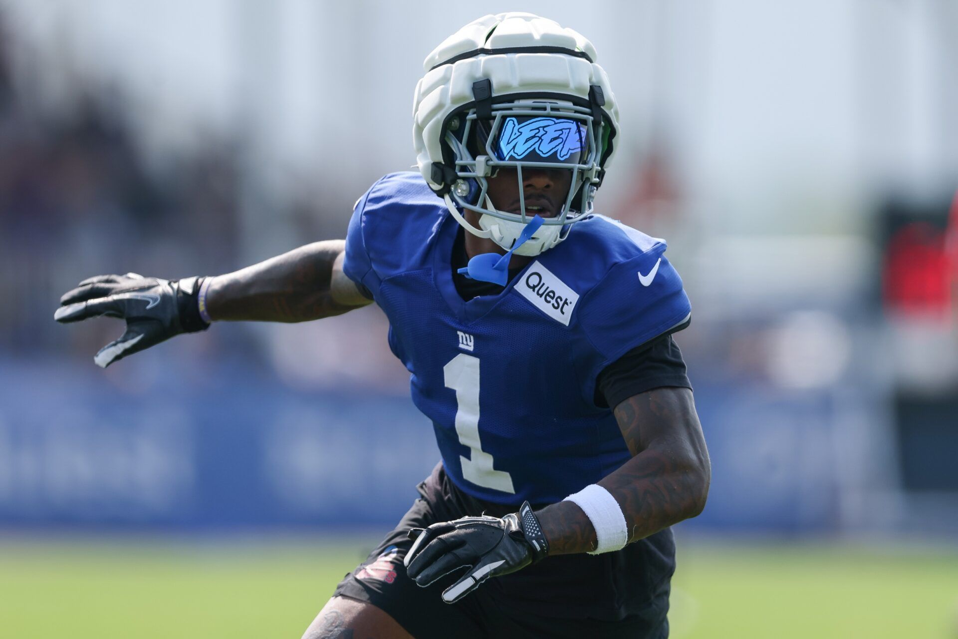 New York Giants wide receiver Malik Nabers (1) runs a route during training camp at Quest Diagnostics Training Center.