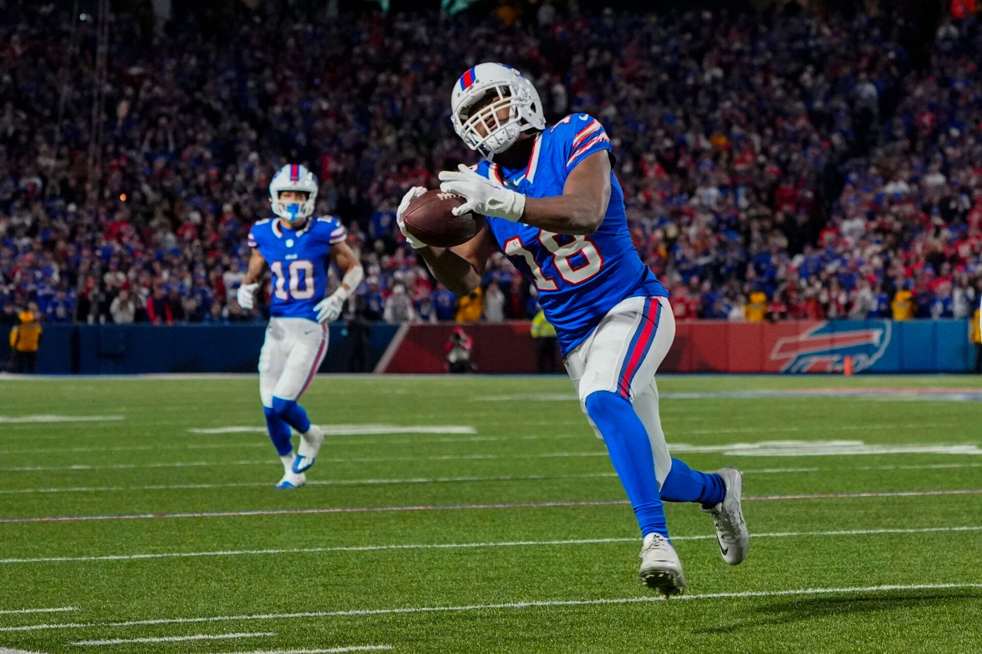 Buffalo Bills wide receiver Amari Cooper (18) makes a catch against the Kansas City Chiefs during the first half at Highmark Stadium.