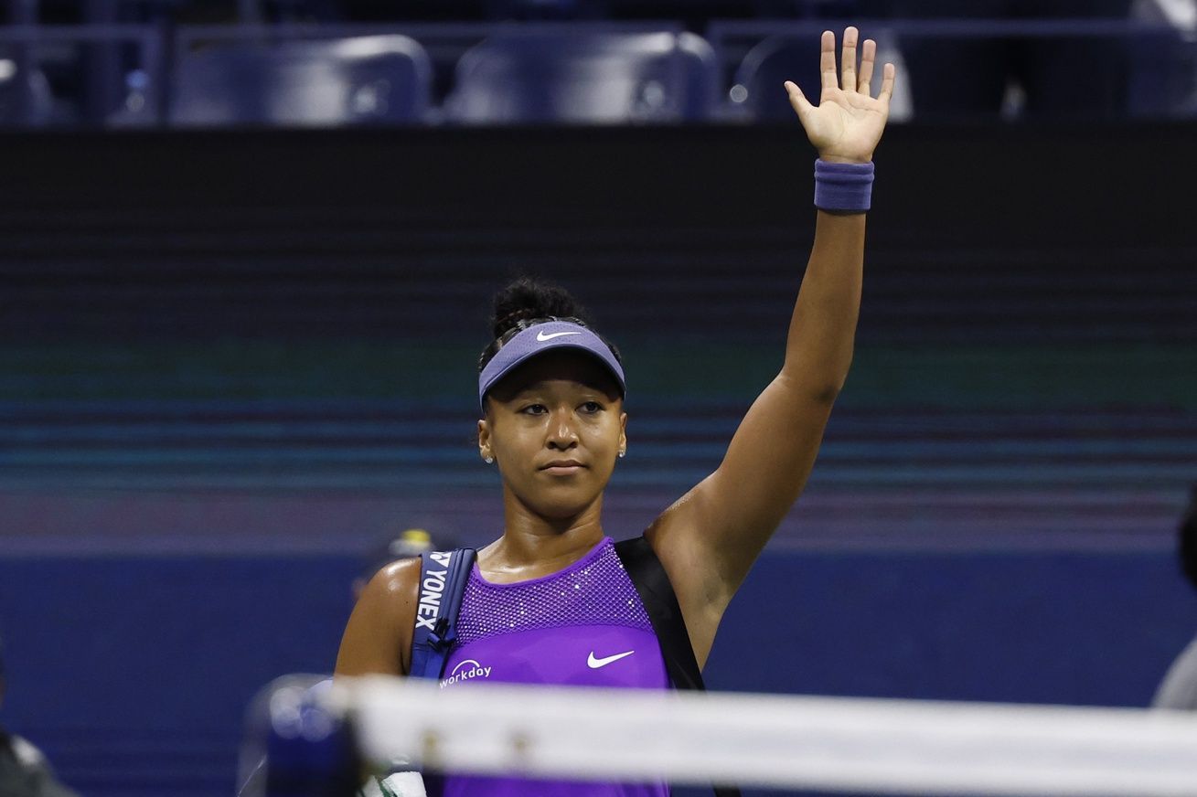 Naomi Osaka (JPN) waves to the crowd while leaving the court after her match against Amanda Anisimova (USA) (not pictured) in a women's singles semifinal of the 2025 US Open tennis championships at USTA Billie Jean King National Tennis Center.