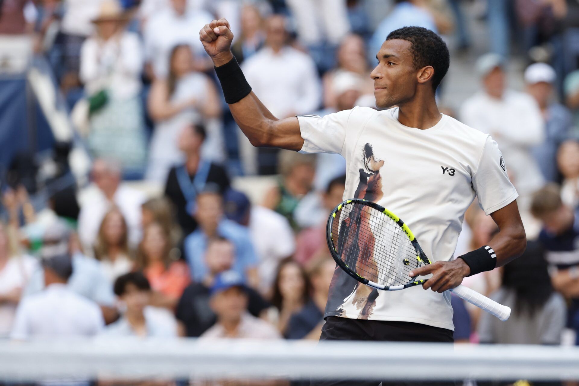 Felix Auger-Aliassime (CAN) celebrates towards his player's box after his match against Alex de Minaur (AUS) (not pictured) on day eleven of the 2025 US Open tennis championships at USTA Billie Jean King National Tennis Center.
