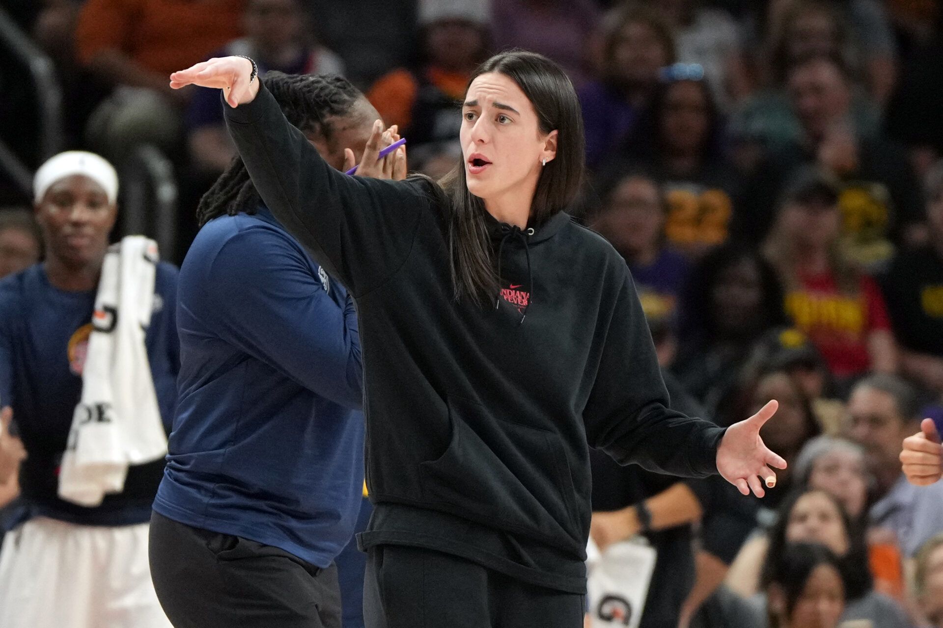 Indiana Fever guard Caitlin Clark (22) reacts to a play against the Phoenix Mercury in the second half at PHX Arena.