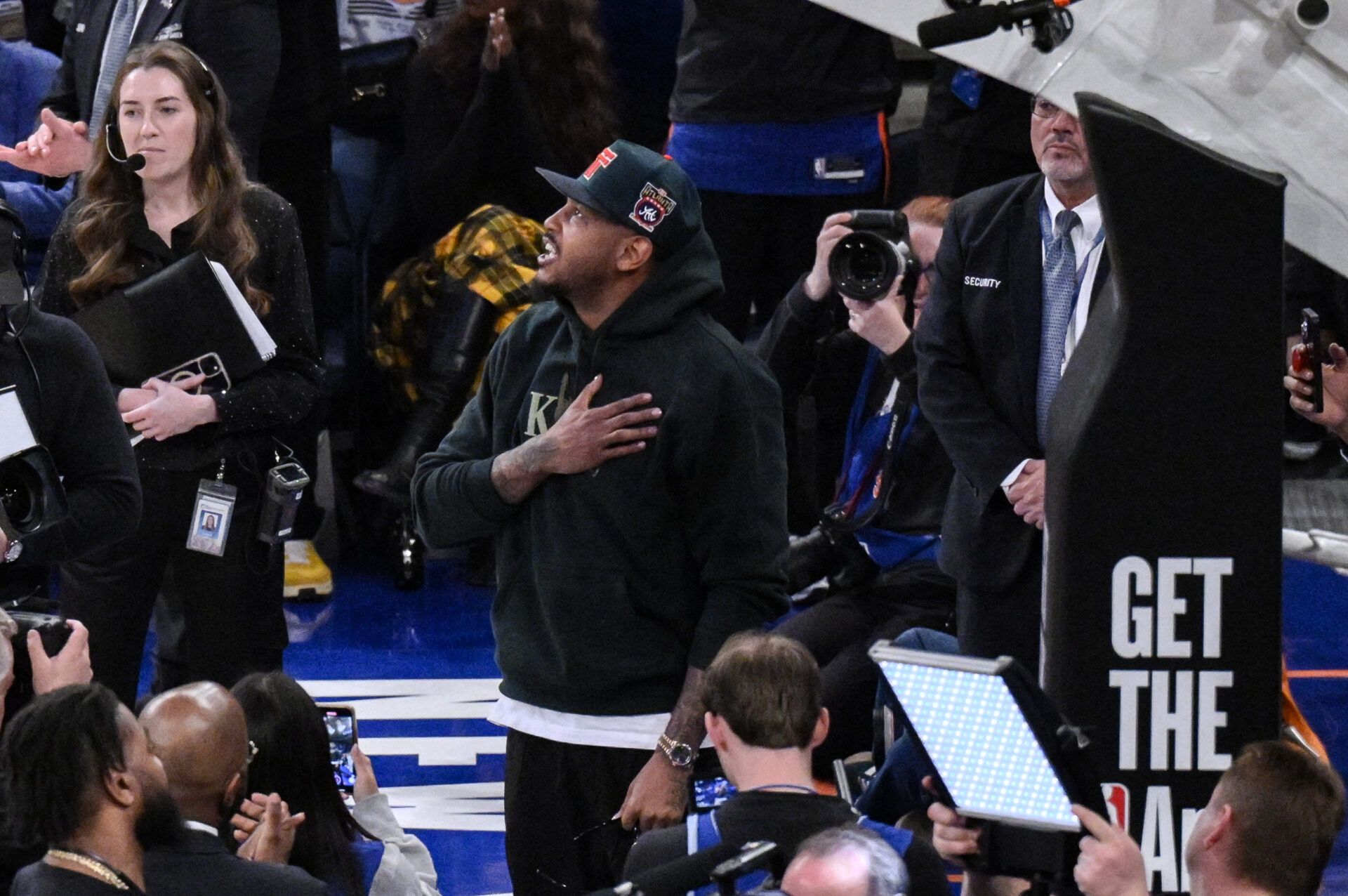 Former New York Knicks great Carmelo Anthony looks on during a video tribute in his honor during the first half against the Boston Celtics at Madison Square Garden.