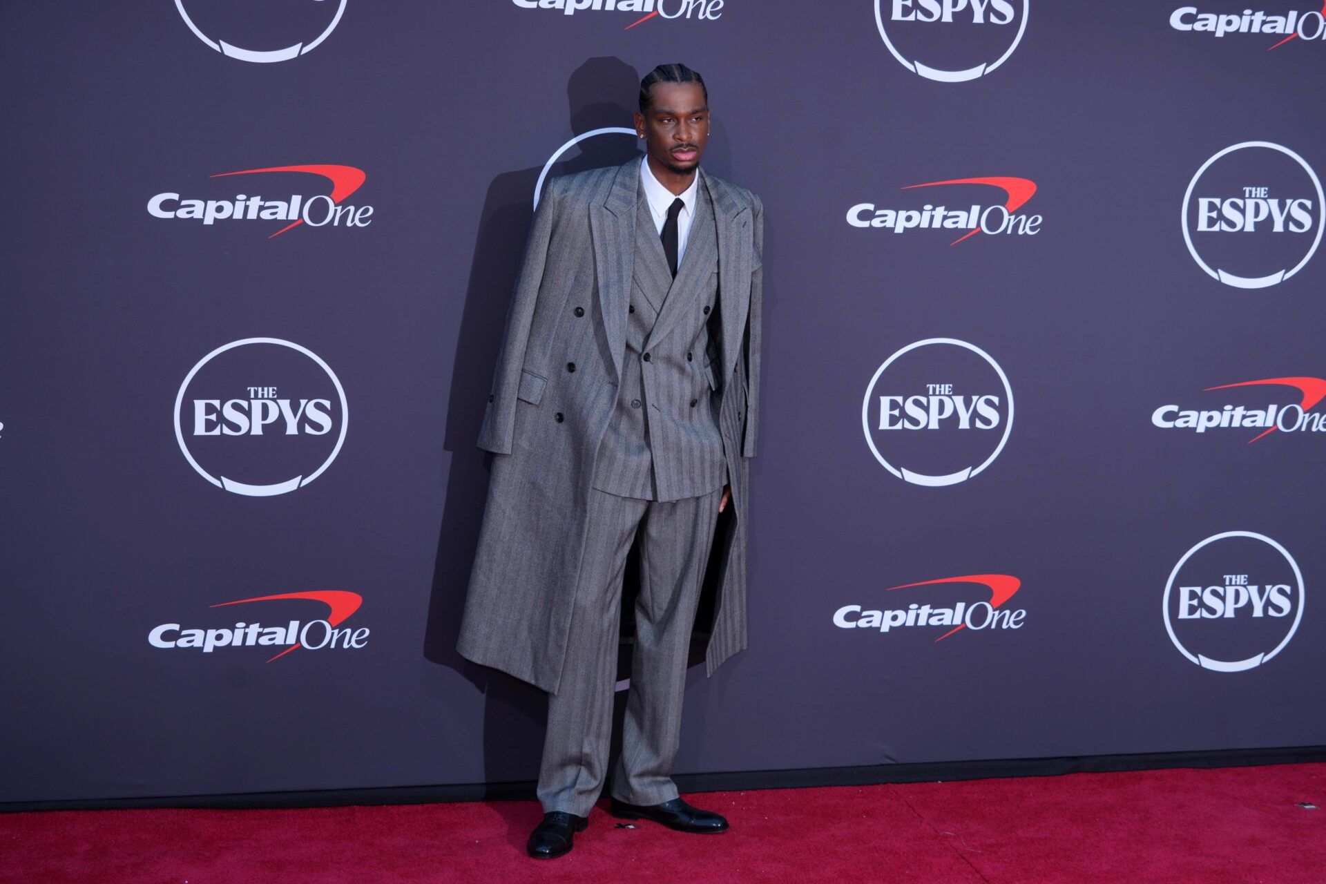 Shai Gilgeous-Alexander poses on the ESPYs red carpet at the Dolby Theatre.