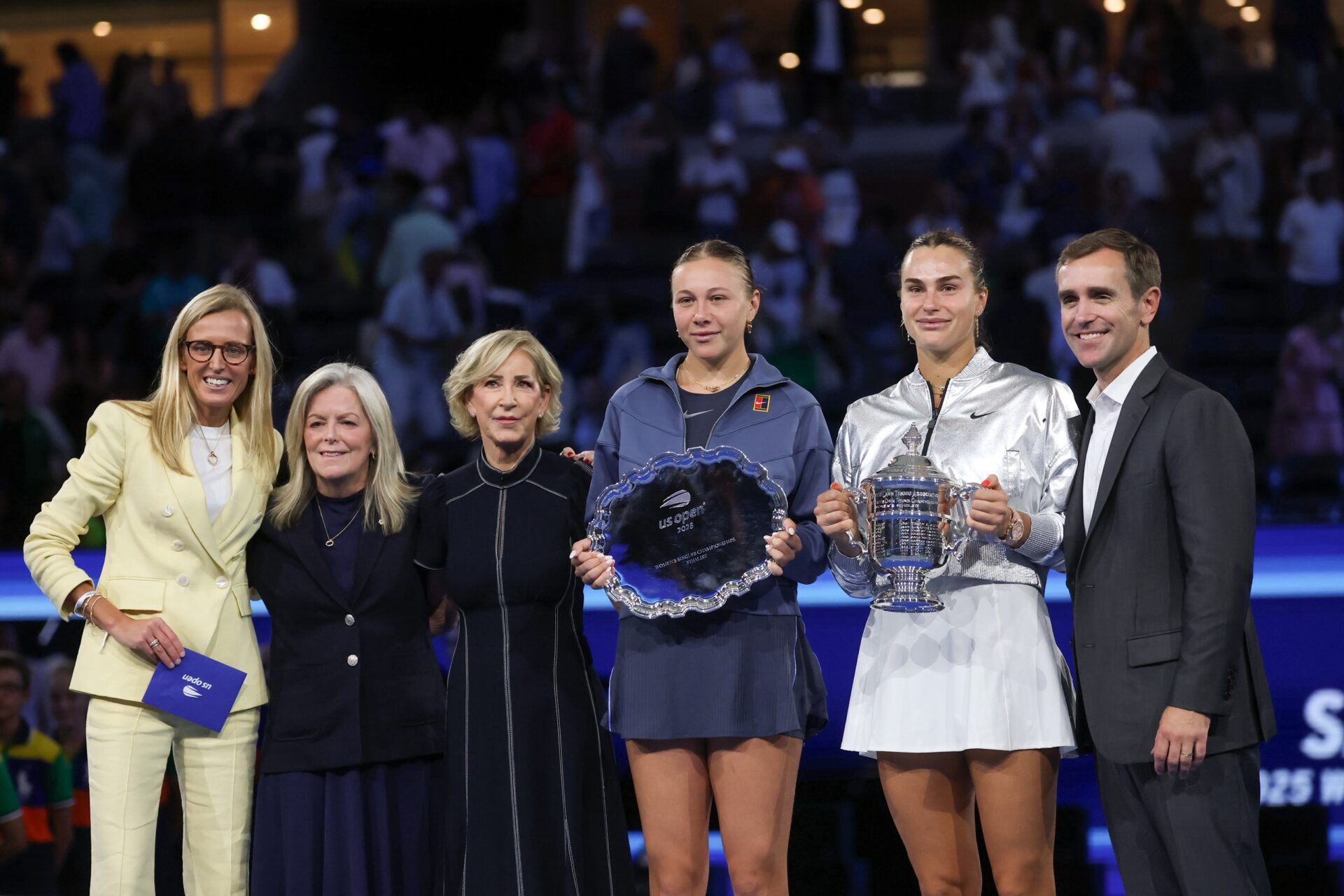Amanda Anisimova (USA) and Aryna Sabalenka pose for a photo with their trophies after the women's singles final of the 2025 US Open tennis championships at Billie Jean King National Tennis Center.