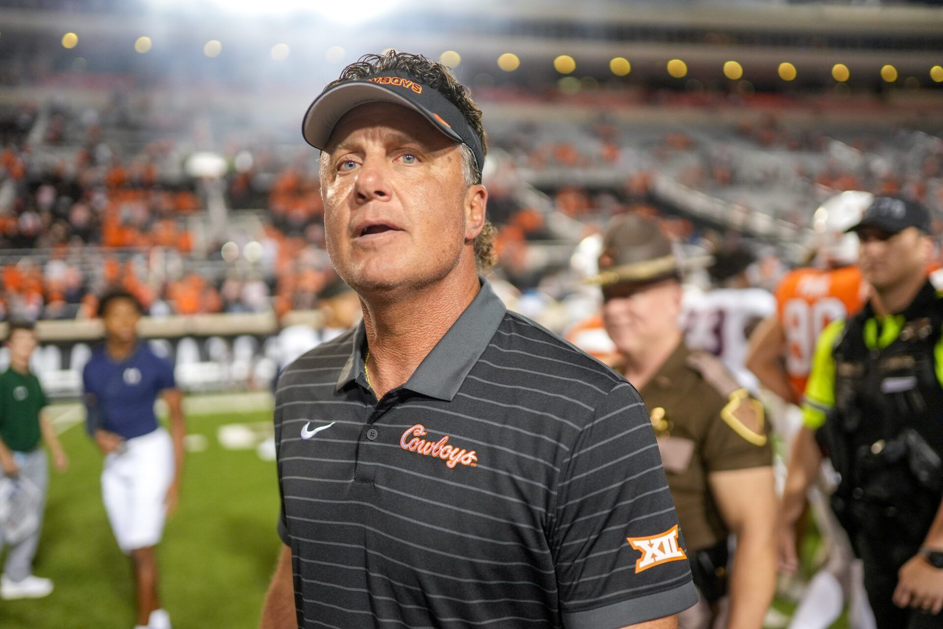 Oklahoma State head coach Mike Gundy walks off the field after an NCAA football game between Oklahoma State (OSU) and UT Martin in Stillwater, Okla., on Thursday, Aug. 28, 2025.