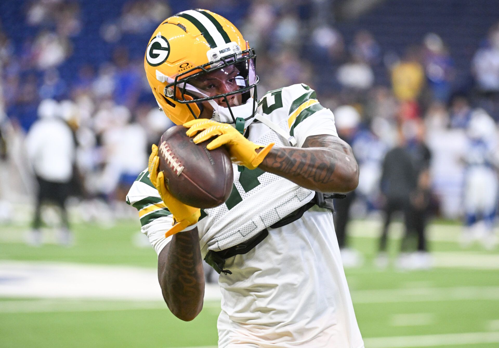 Green Bay Packers wide receiver Matthew Golden (22) catches a pass during warmups prior to the game against the Indianapolis Colts at Lucas Oil Stadium.