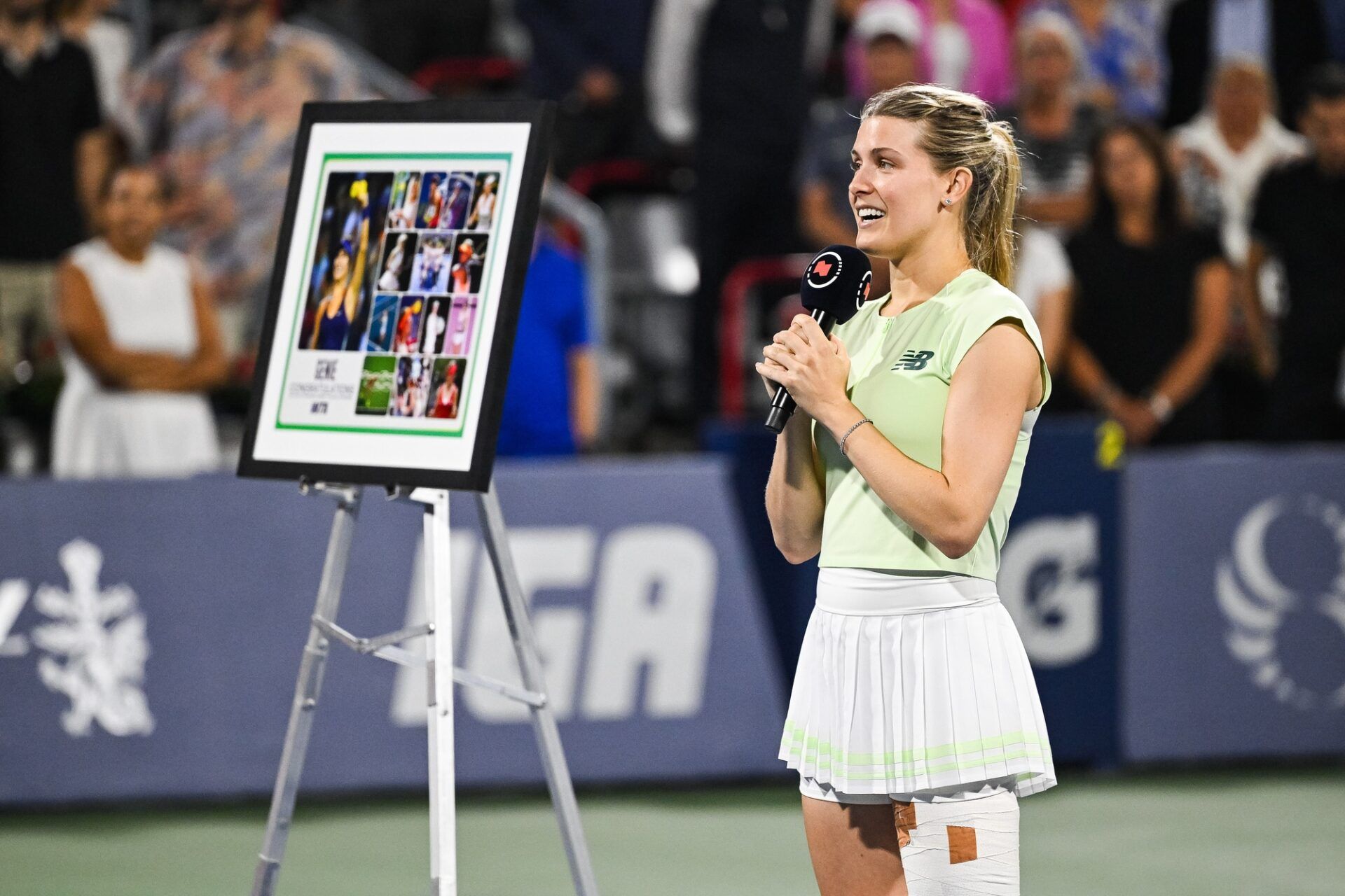 Eugenie Bouchard (CAN) addresses the crowd during her retirement ceremony at IGA Stadium.