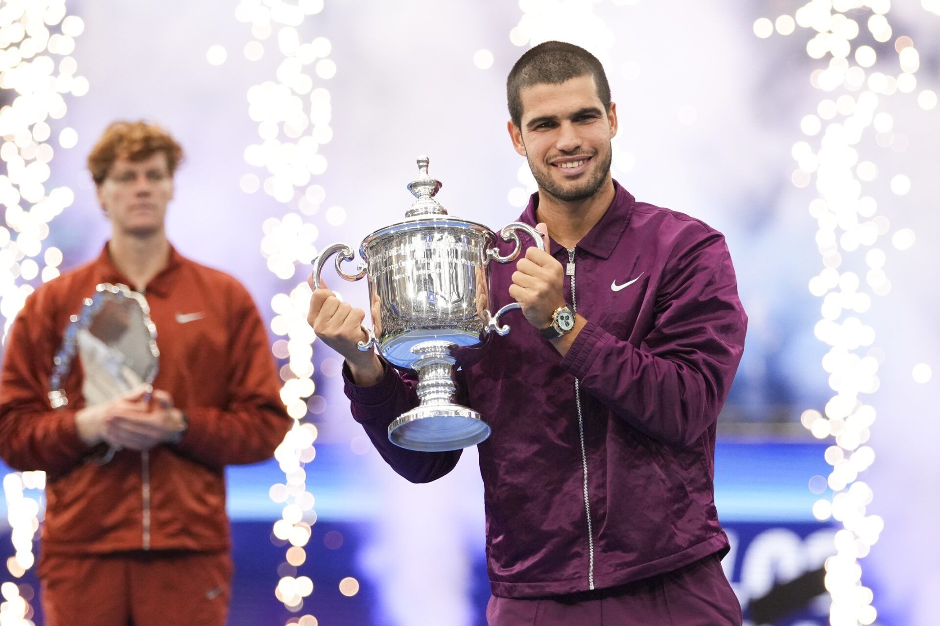 Carlos Alcaraz (ESP) holds the trophy after defeating Jannik Sinner (ITA) in the final of mens singles at Billie Jean King National Tennis Center.