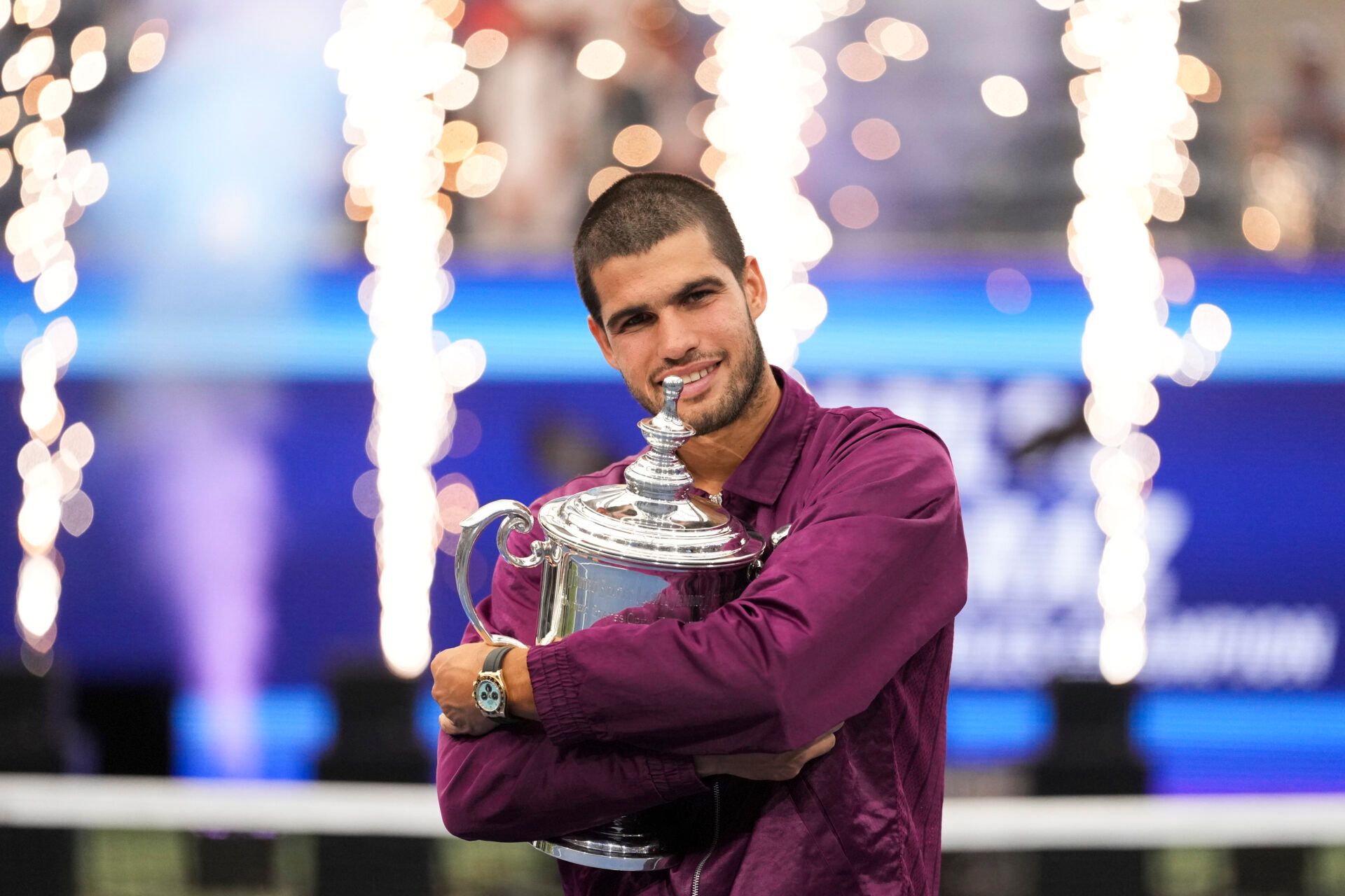 Carlos Alcaraz (ESP) hugs the trophy after defeating Jannik Sinner (ITA) (not pictured) in the final of mens singles at Billie Jean King National Tennis Center.