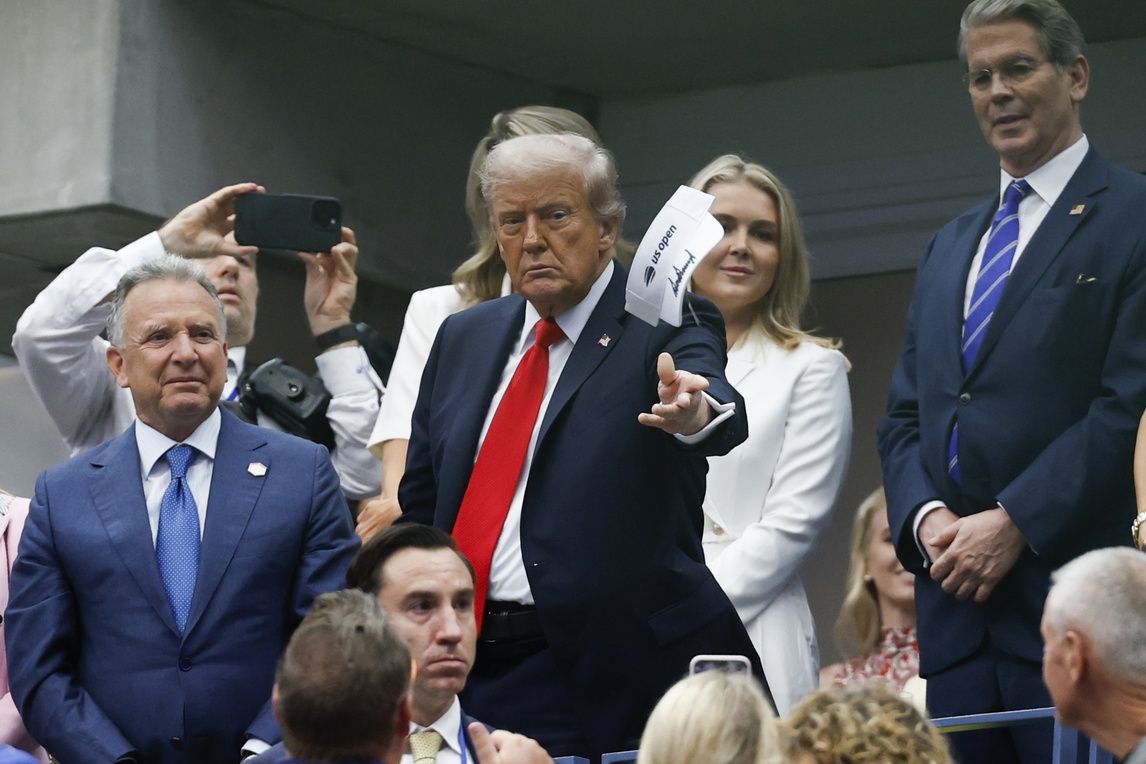 President Donald Trump throws an autographed visor after the final of mens singles at Billie Jean King National Tennis Center.