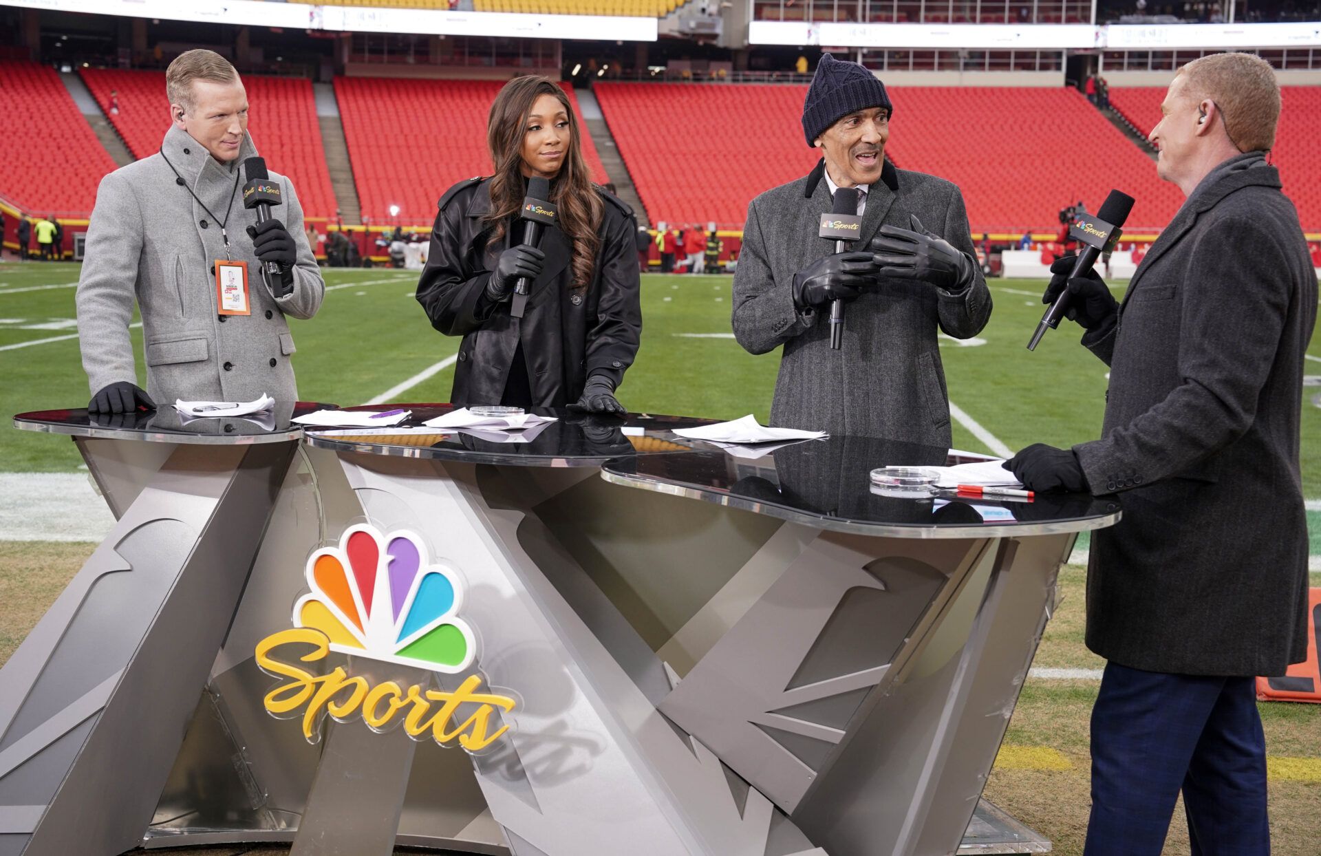 CBS Sports announcers Chris Simms and Maria Taylor and Tony Dungy and Jason Garrett on field prior to an AFC divisional round game between the Kansas City Chiefs and Jacksonville Jaguars at GEHA Field at Arrowhead Stadium.
