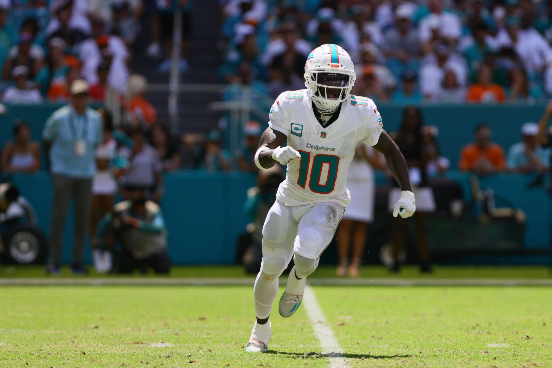 Miami Dolphins wide receiver Tyreek Hill (10) runs on the field against the Jacksonville Jaguars during the first quarter at Hard Rock Stadium.