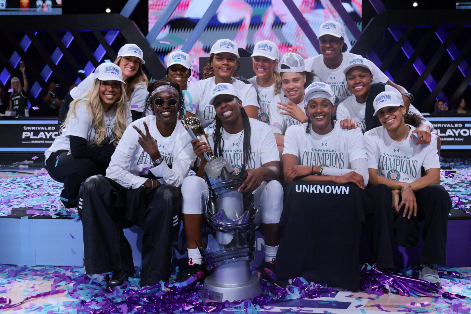 Rose BC guard Chelsea Gray (center) celebrates with teammates after winning the Unrivaled Championship game against the Vinyl BC at Wayfair Arena.