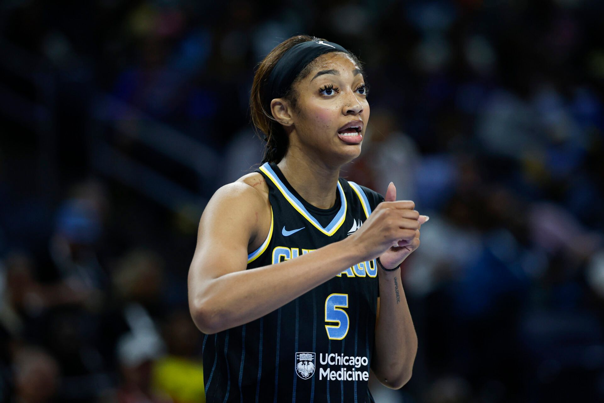 Chicago Sky forward Angel Reese (5) reacts during the second half of a WNBA game against the Las Vegas Aces at Wintrust Arena.