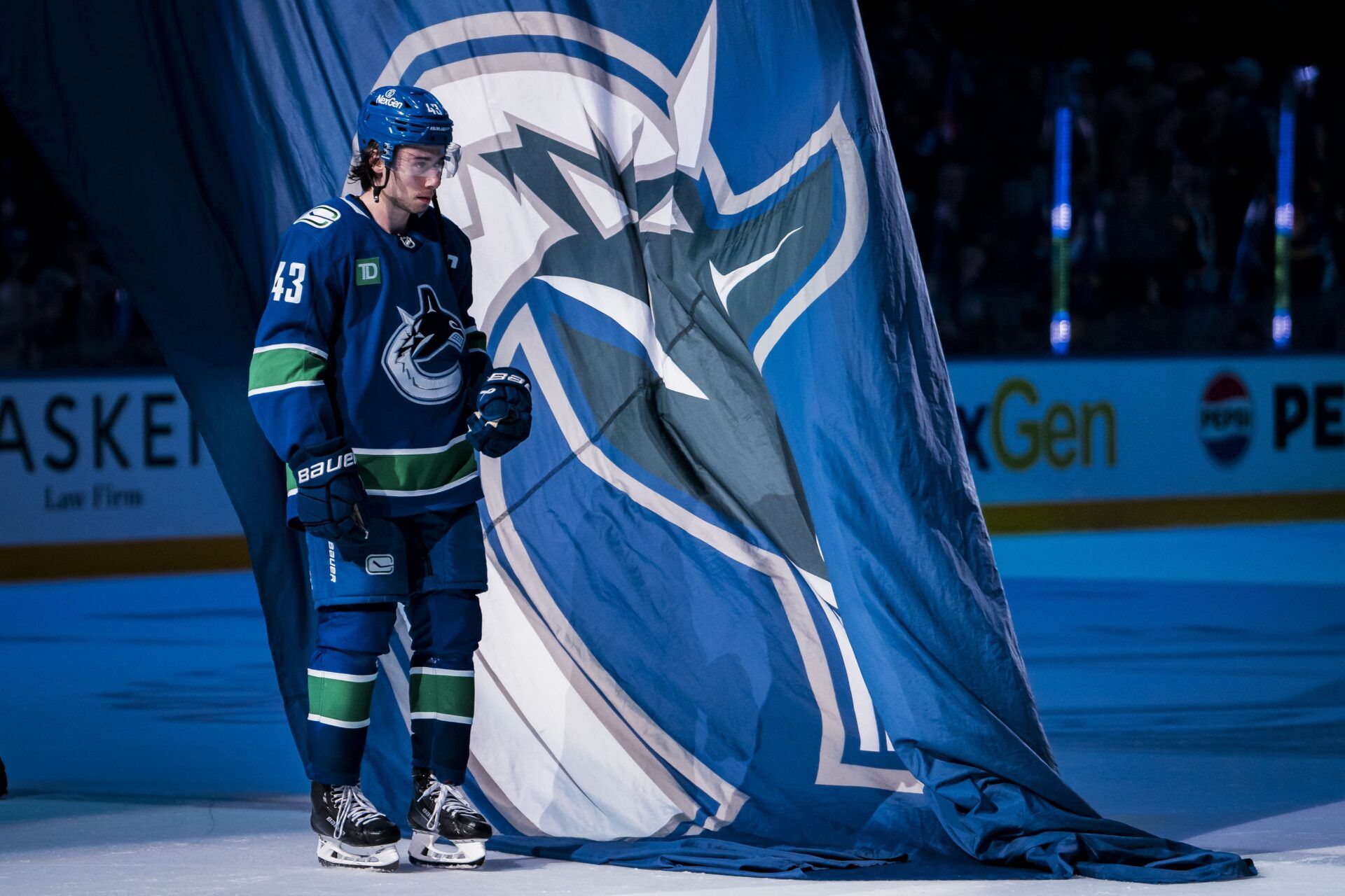 Vancouver Canucks defenseman Quinn Hughes (43) skates out as the third star of the game against the San Jose Sharks at Rogers Arena.