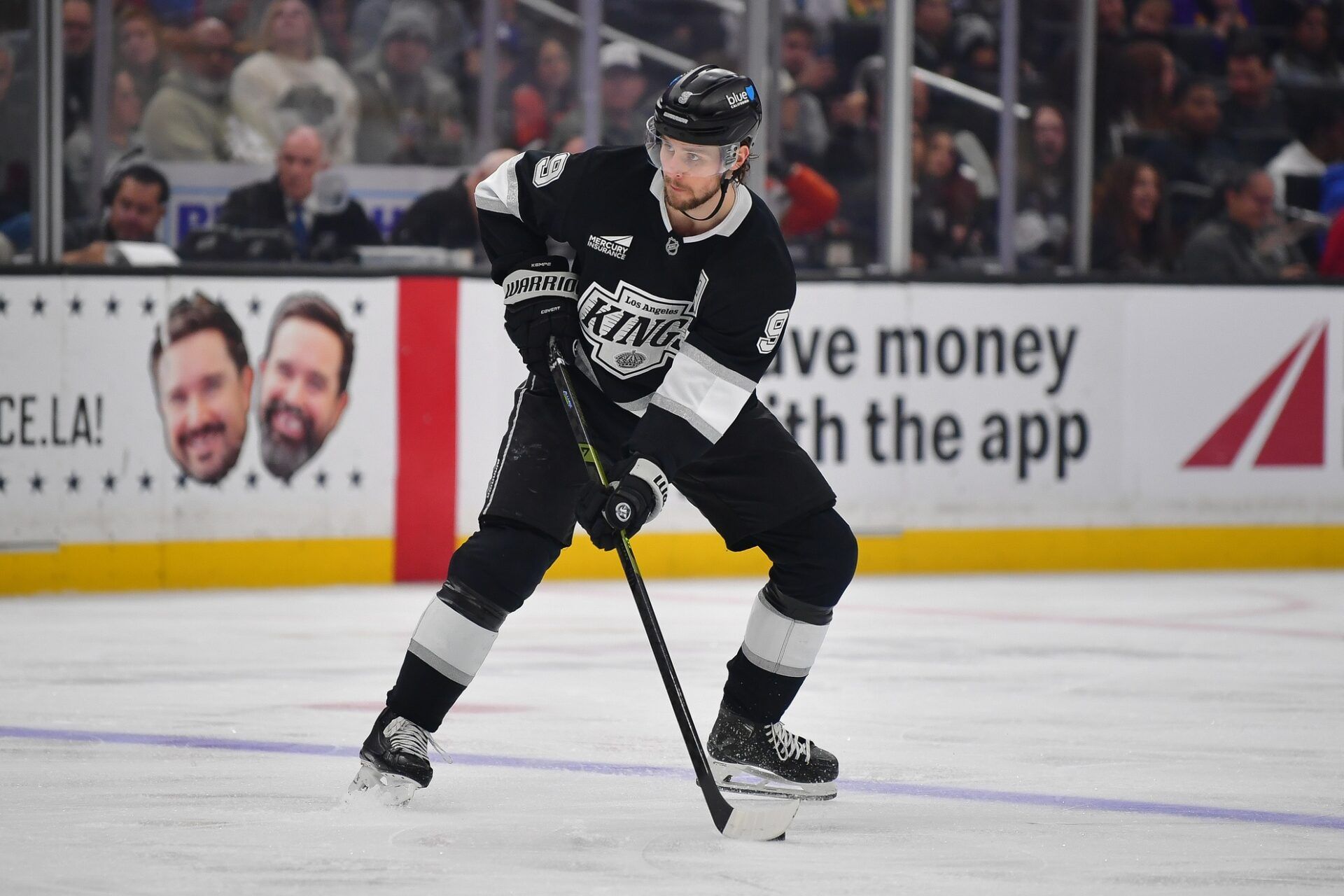 Los Angeles Kings right wing Adrian Kempe (9) controls the puck against the Anaheim Ducks during the second period at Crypto.com Arena.
