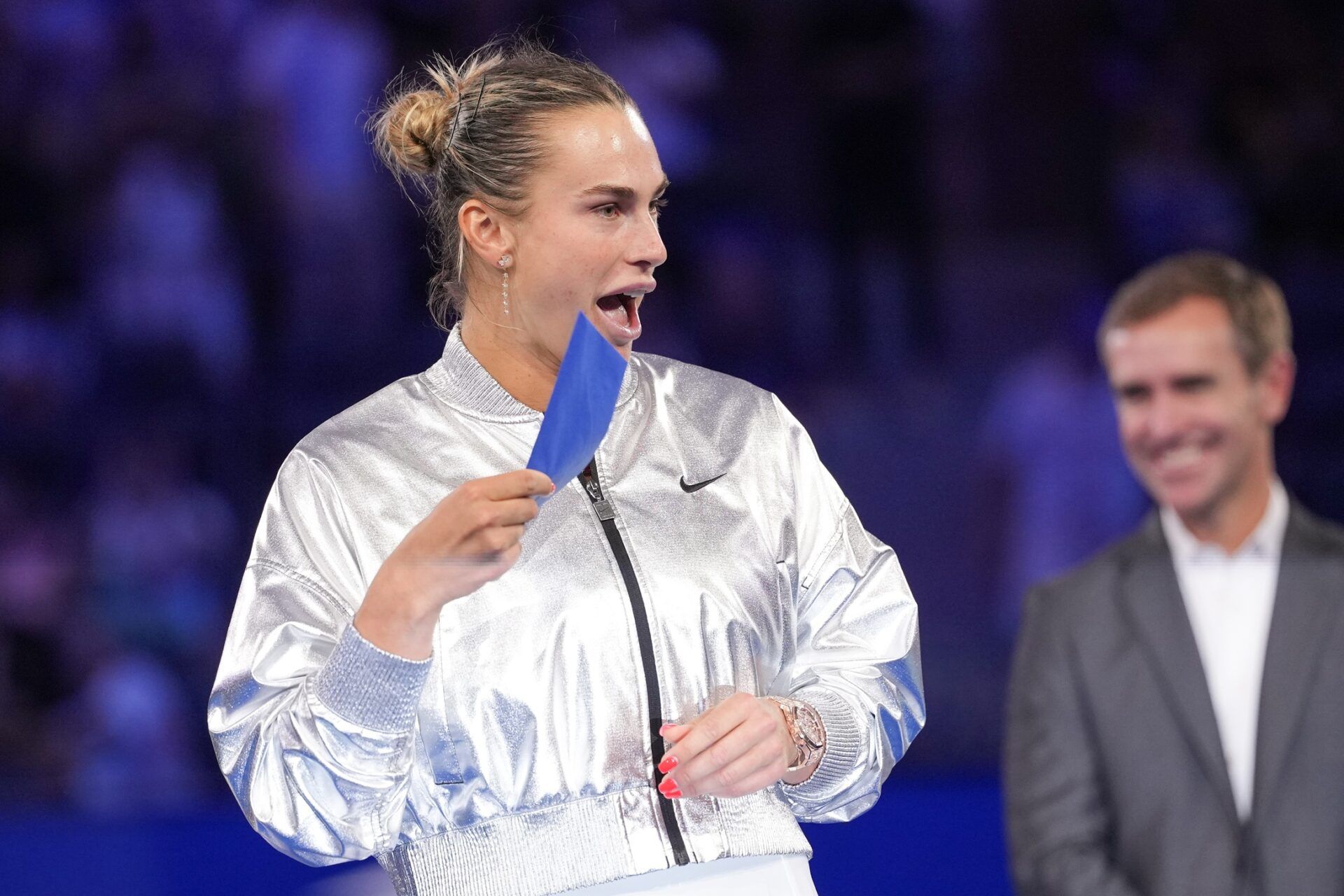 Aryna Sabalenka reacts after receiving the championship check after winning the women's singles final against Amanda Anisimova (USA) (not pictured) of the 2025 US Open tennis championships at Billie Jean King National Tennis Center.