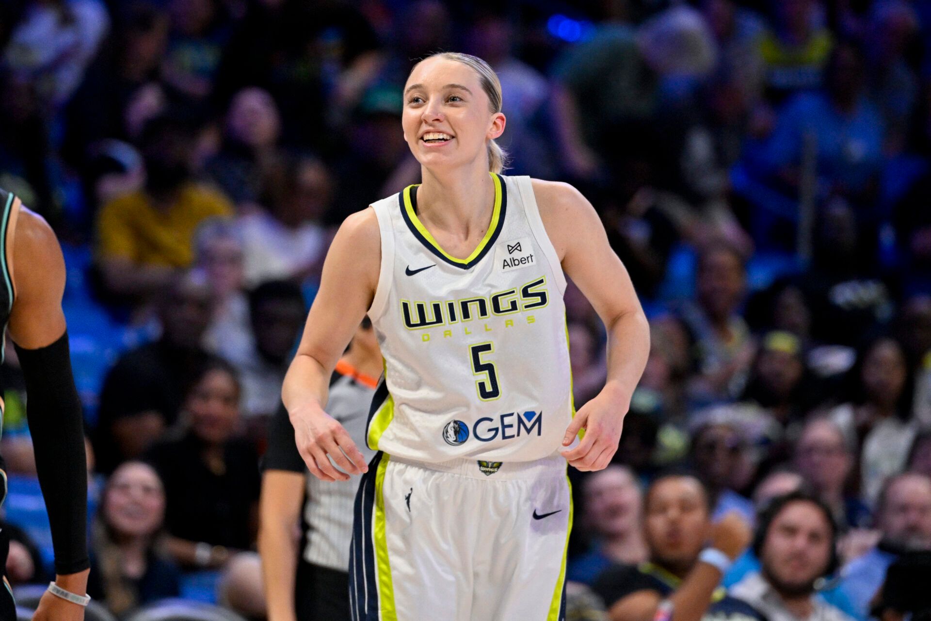 Dallas Wings guard Paige Bueckers (5) celebrates during the game between the Dallas Wings and the New York Liberty at College Park Center.