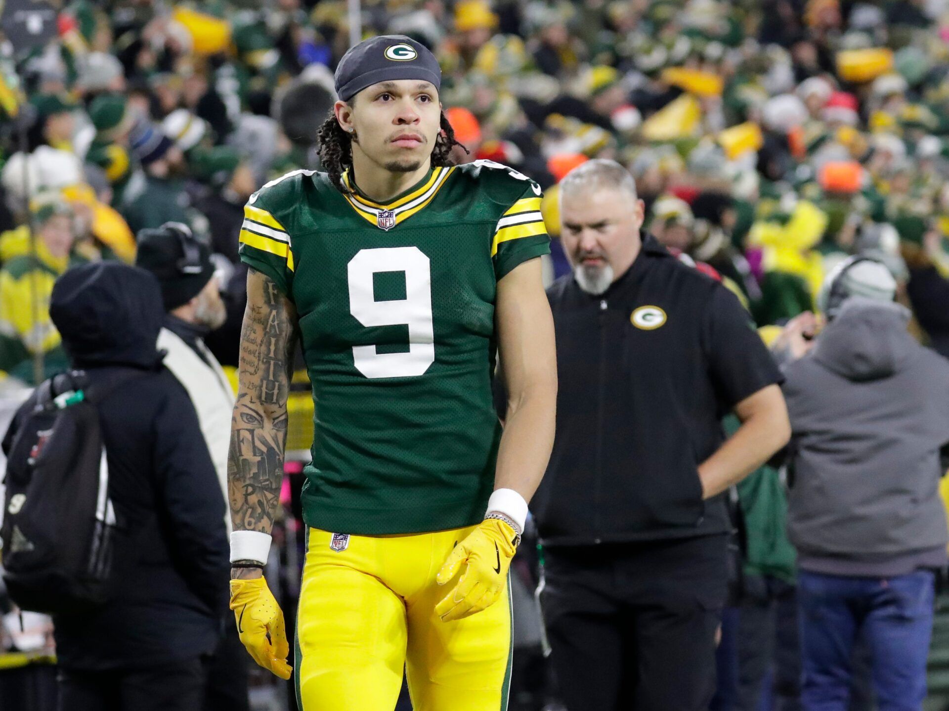 Green Bay Packers wide receiver Christian Watson (9) leaves the field in the fourth quarter after getting injured against the New Orleans Saints during their football game Monday, December 23, 2024, at Lambeau Field in Green Bay, Wisconsin.