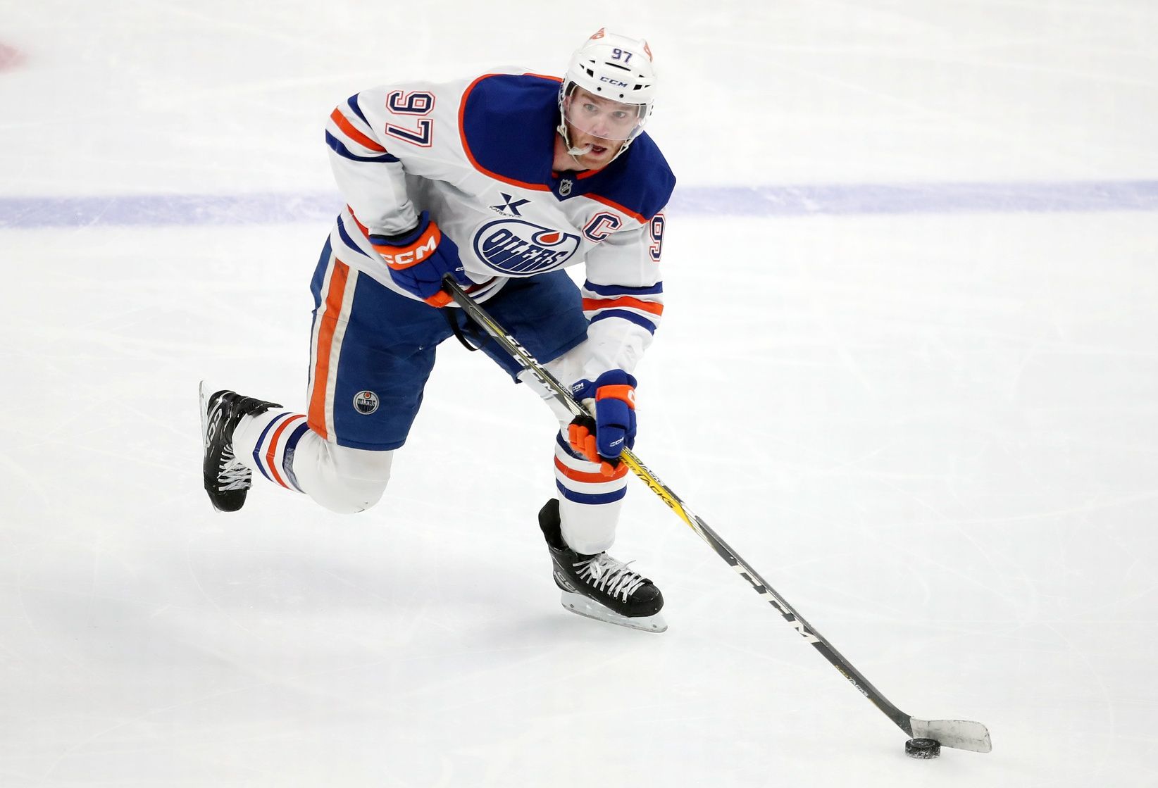 Edmonton Oilers center Connor McDavid (97) skates up ice with the puck against the Pittsburgh Penguins during the third period at PPG Paints Arena.
