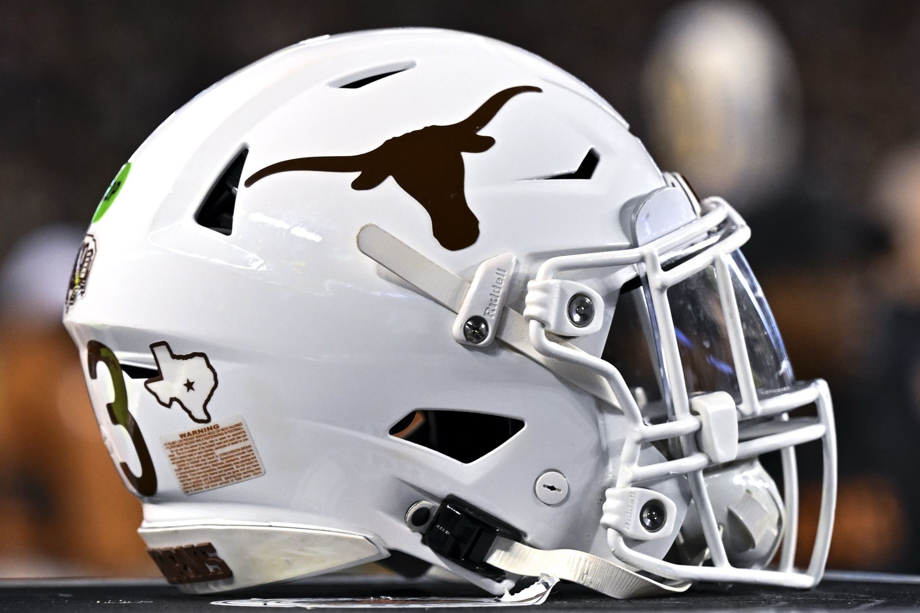 A detail view of a Texas Longhorns helmet on the sideline during the first quarter against the Texas A&M Aggies. The Longhorns defeated the Aggies 17-7 at Kyle Field.