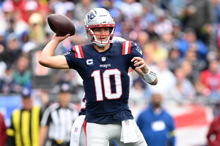 New England Patriots quarterback Drake Maye (10) drops back to pass against the Las Vegas Raiders in the first half at Gillette Stadium.