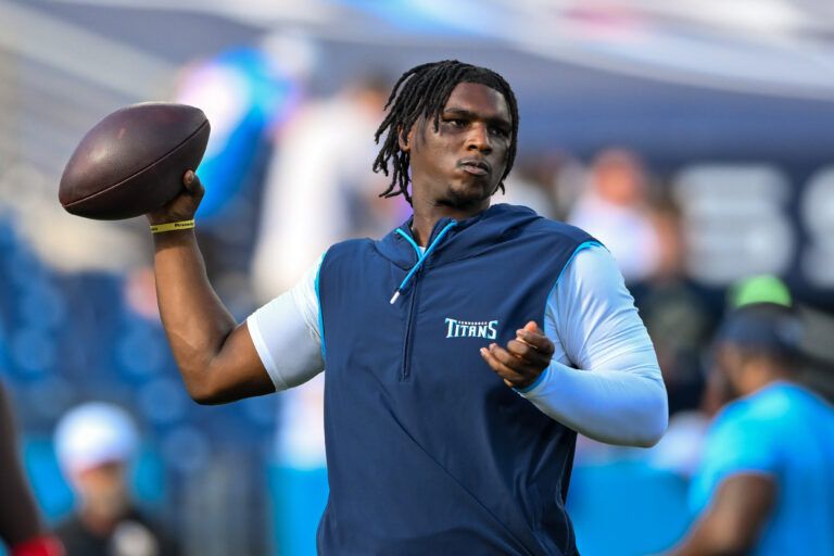 Tennessee Titans quarterback Cameron Ward (1) throws during pre-game warm-ups at Nissan Stadium.