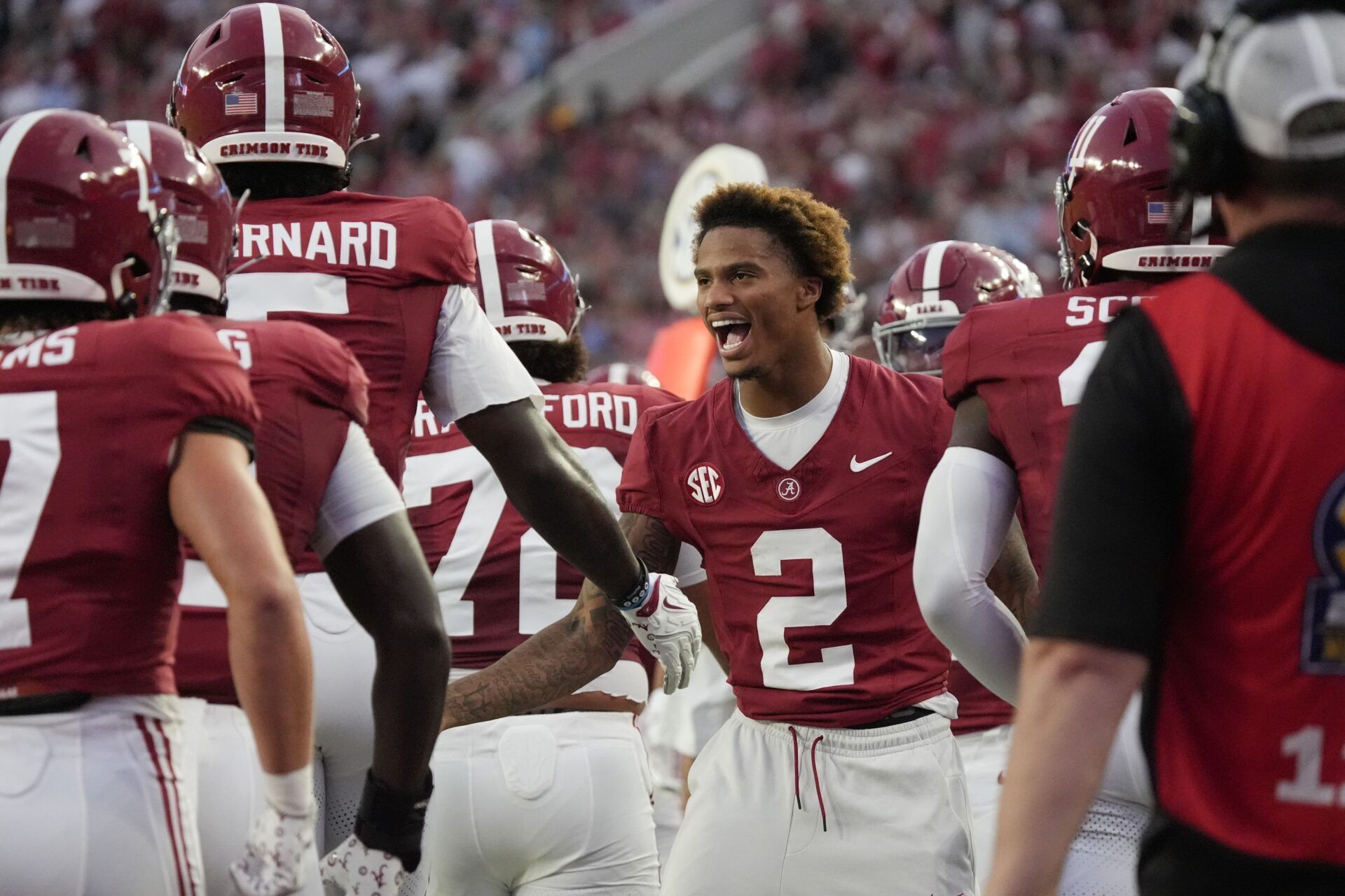 Alabama wide receiver Ryan Williams (2), who is out with an injury, congratulates teammates after a touchdown against UL Monroe at Saban Field at Bryant-Denny Stadium.