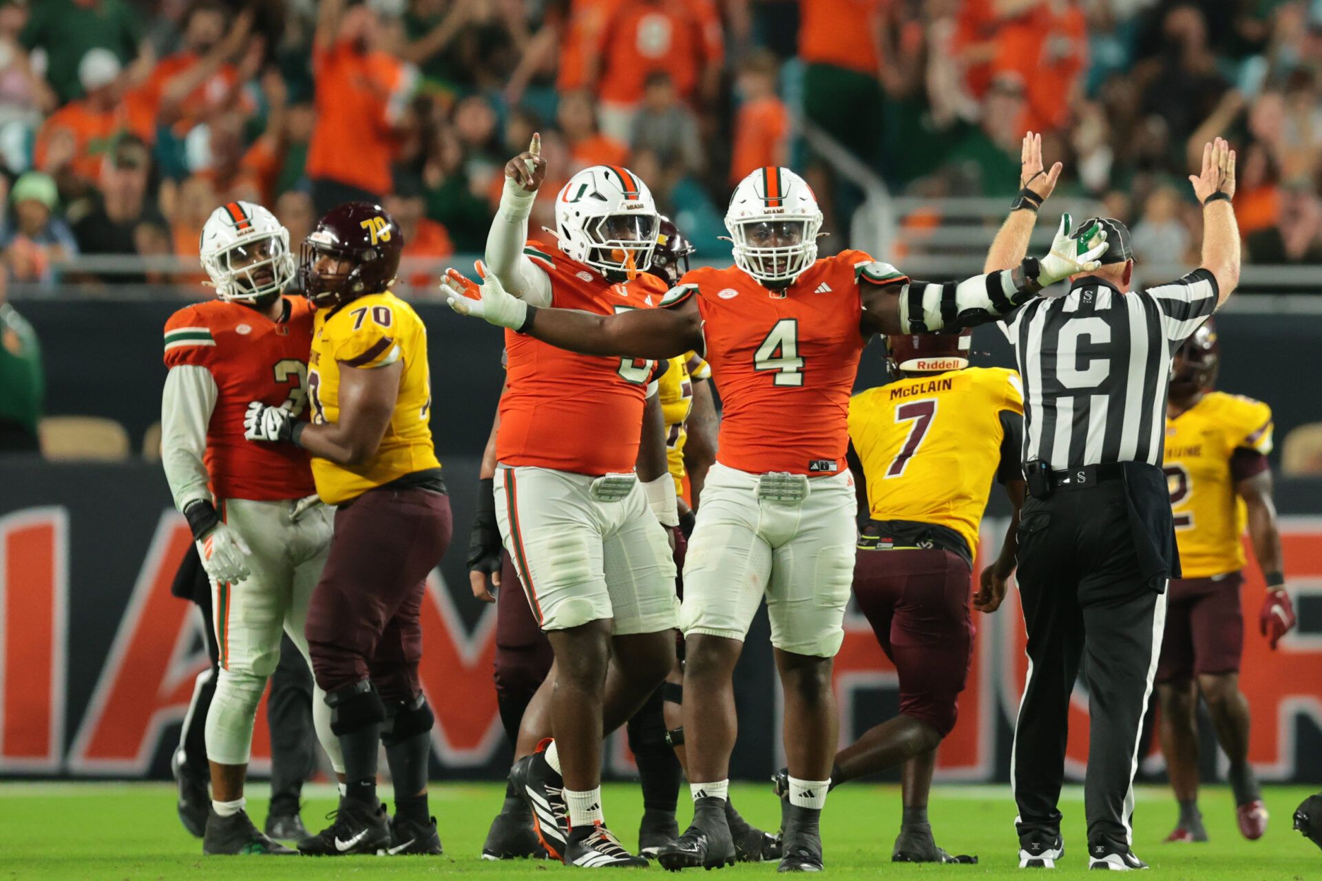 Miami Hurricanes defensive lineman Rueben Bain Jr. (4) reacts after a sack against the Bethune-Cookman Wildcats during the third quarter at Hard Rock Stadium.