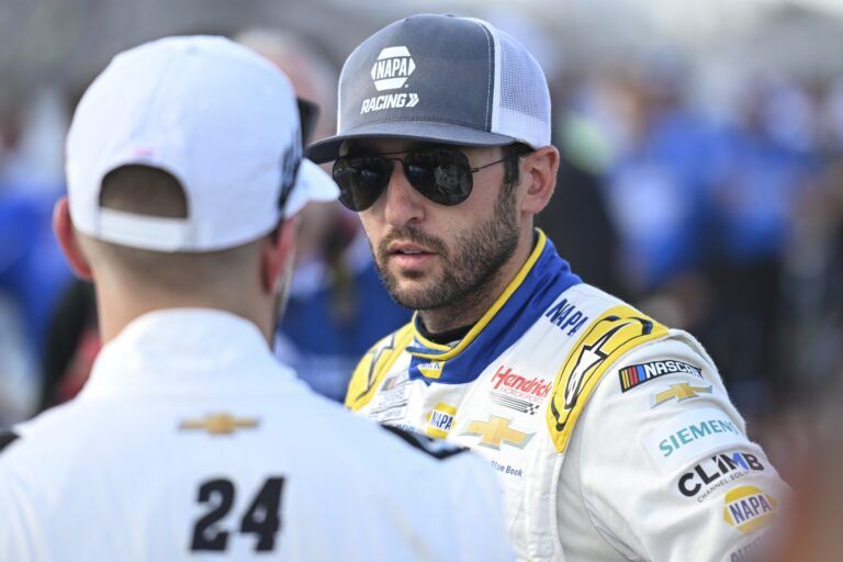 NASCAR Cup Series driver Chase Elliott (9) speaks with NASCAR Cup Series driver William Byron (24) during practice and qualifying for the Enjoy Illinois 300 at World Wide Technology Raceway.