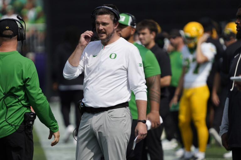 Oregon Ducks head coach Dan Lanning on the sideline against the Northwestern Wildcats during the first half at Northwestern Medicine Field at Martin Stadium.