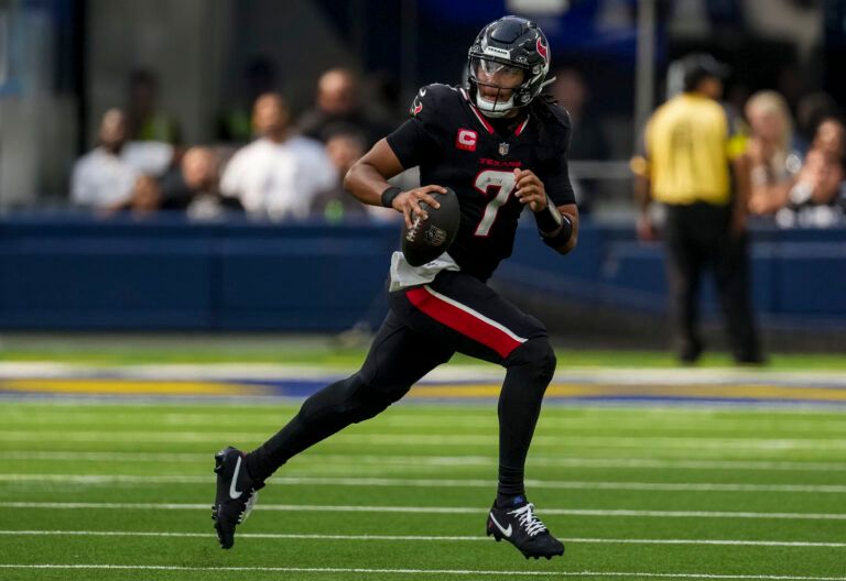 Houston Texans quarterback C.J. Stroud (7) looks for a reciever during the third quarter at SoFi Stadium.
