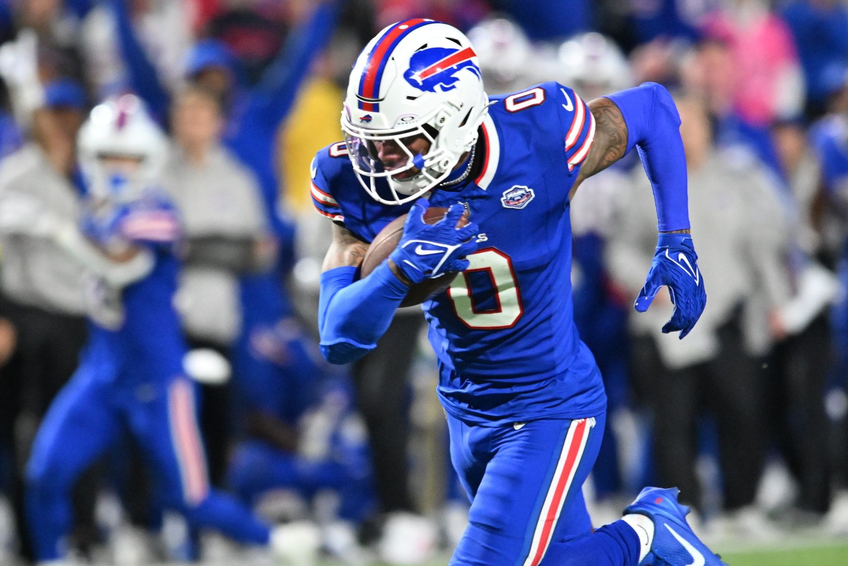 Buffalo Bills wide receiver Keon Coleman (0) runs the ball during the fourth quarter against the Baltimore Ravens at Highmark Stadium.