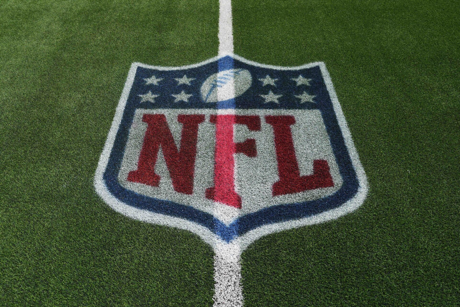 An NFL shield logo on the field at SoFi Stadium.