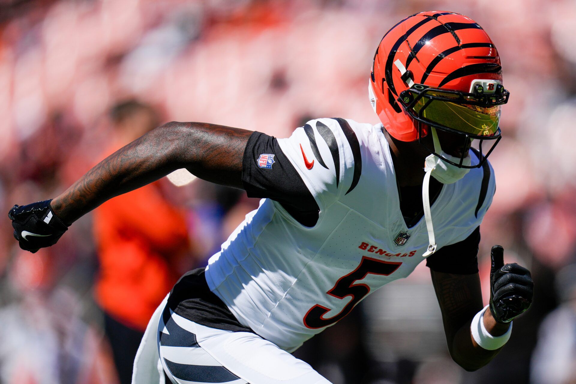 Cincinnati Bengals wide receiver Tee Higgins (5) runs a route during warmups before the NFL Week 1 game between the Cleveland Browns and the Cincinnati Bengals at Huntington Bank Field in Cleveland on Sunday, Sept. 7, 2025.