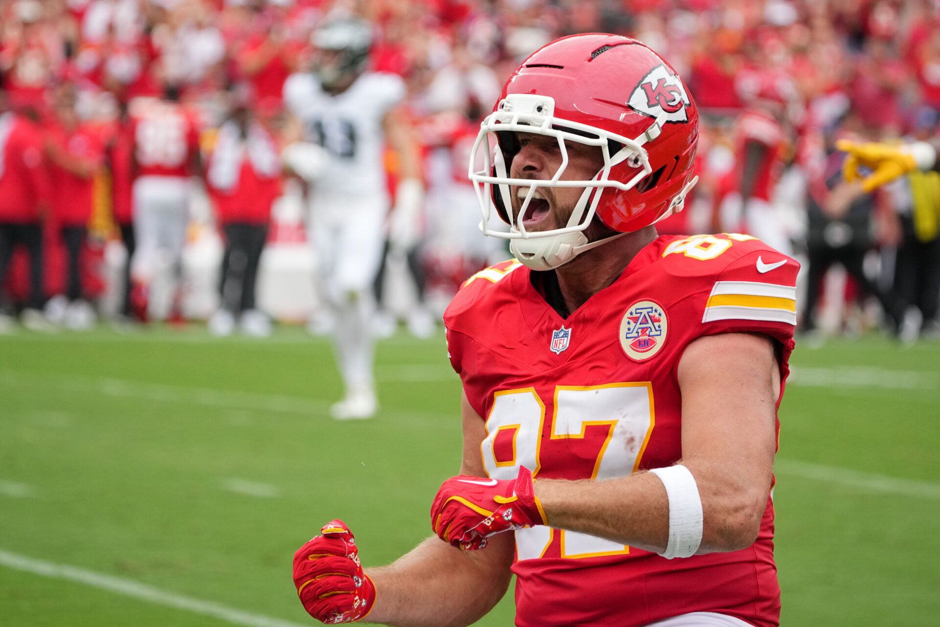 Kansas City Chiefs tight end Travis Kelce (87) celebrates after a play against the Philadelphia Eagles during the second quarter of the game at GEHA Field at Arrowhead Stadium.