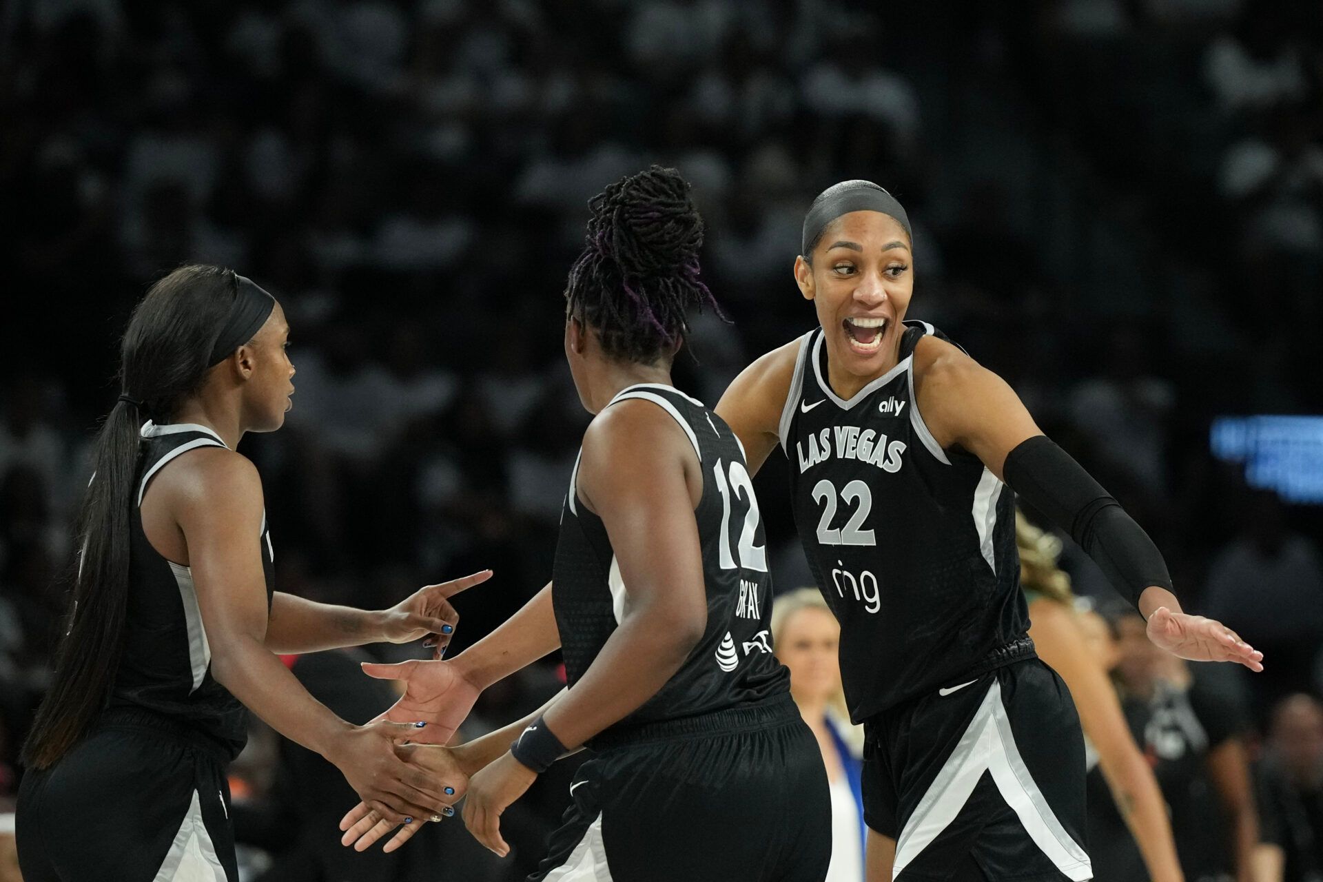 Las Vegas Aces center A'ja Wilson (22) celebrates scoring on the Seattle Storm in the third quarter during game one of round one for the 2025 WNBA Playoffs at Michelob Ultra Arena.