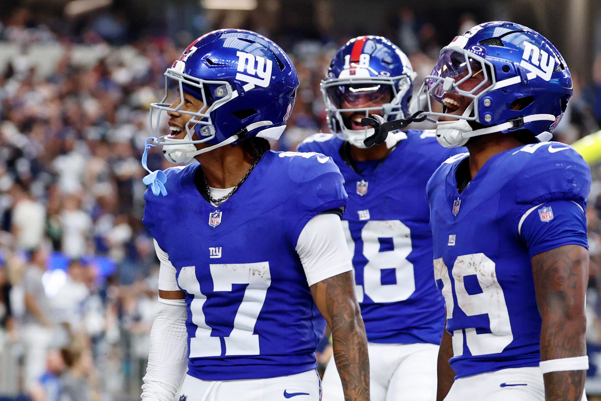 New York Giants wide receiver Wan'Dale Robinson (17) celebrates after scoring a touchdown against the Dallas Cowboys during the fourth quarter at AT&T Stadium.