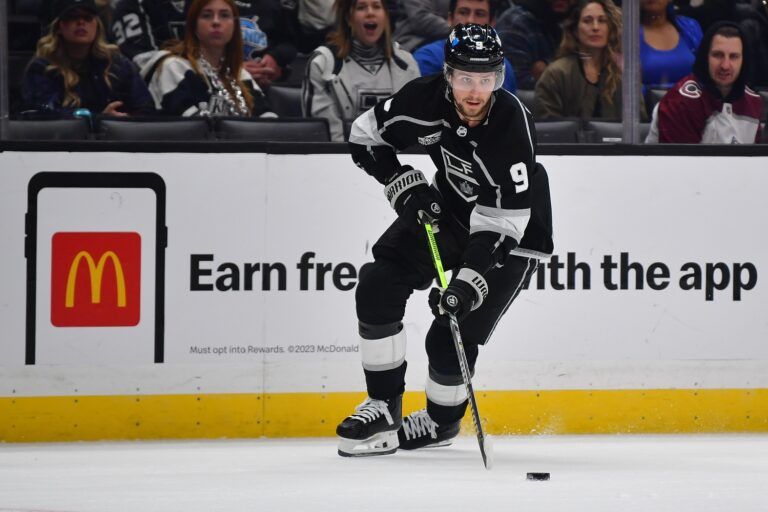 Los Angeles Kings center Adrian Kempe (9) moves the puck against the Colorado Avalanche during the second period at Crypto.com Arena.