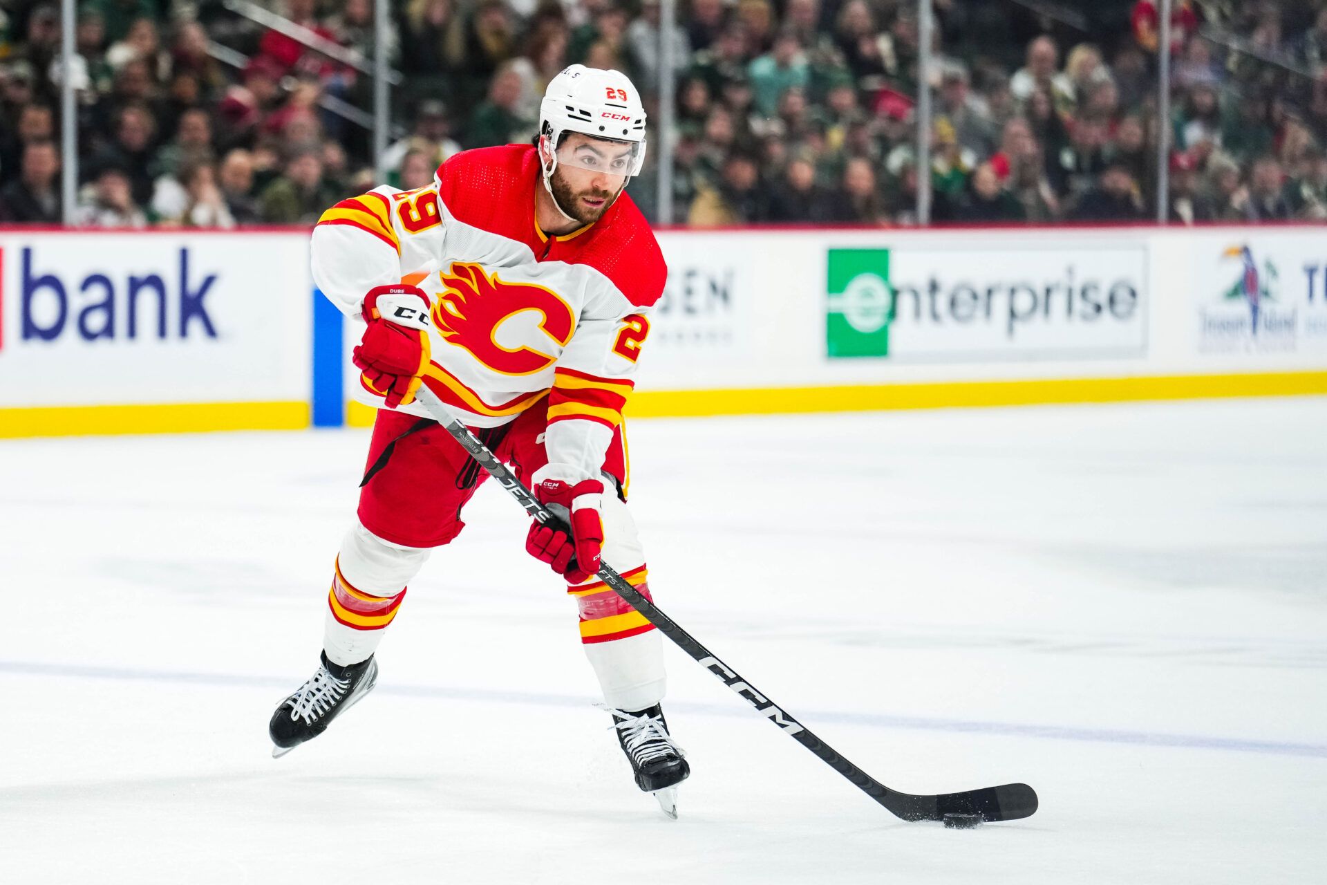 Calgary Flames center Dillon Dube (29) passes during the first period against the Minnesota Wild at Xcel Energy Center.