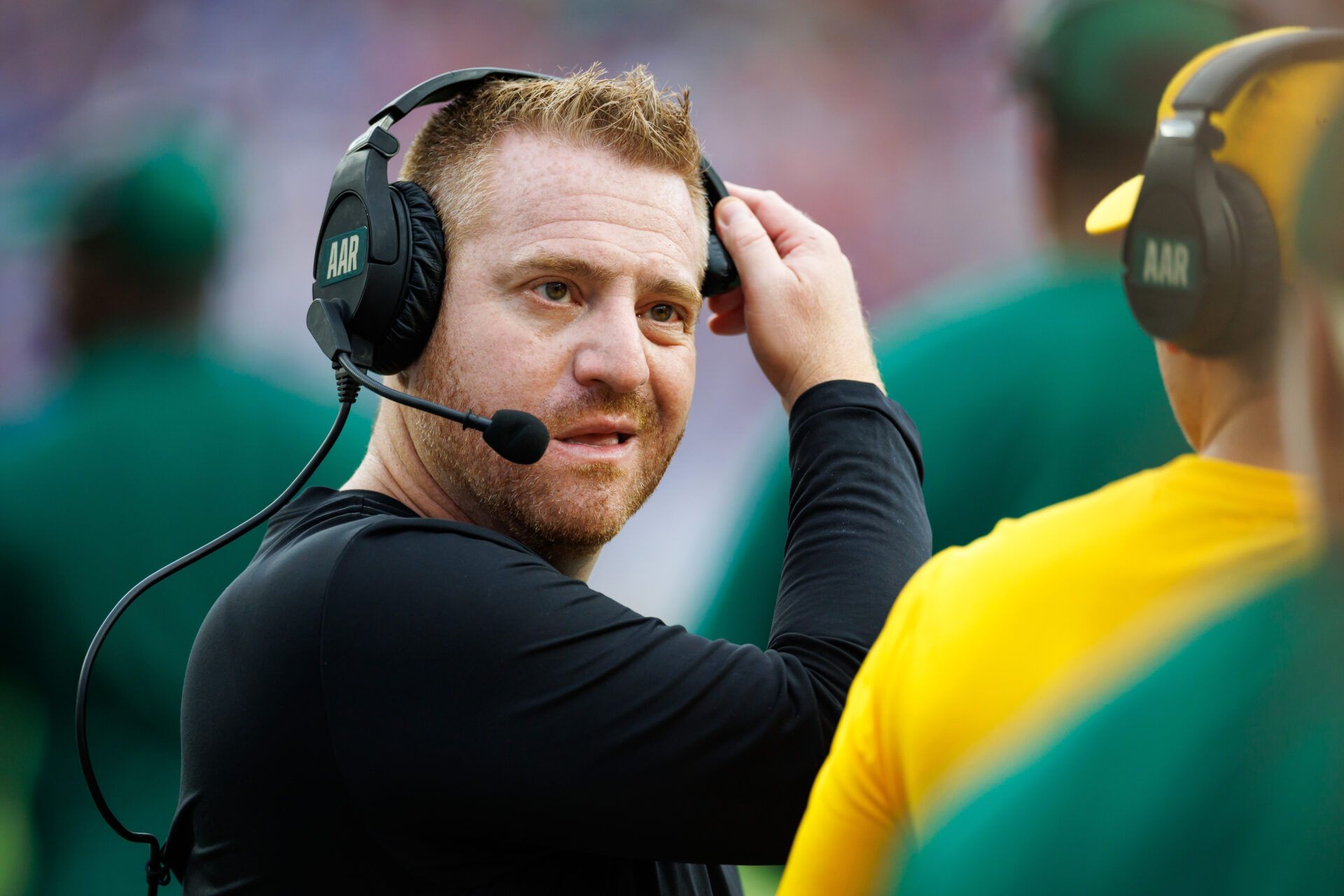 South Florida Bulls head coach Alex Golesh looks on against the Florida Gators during the first half at Ben Hill Griffin Stadium.