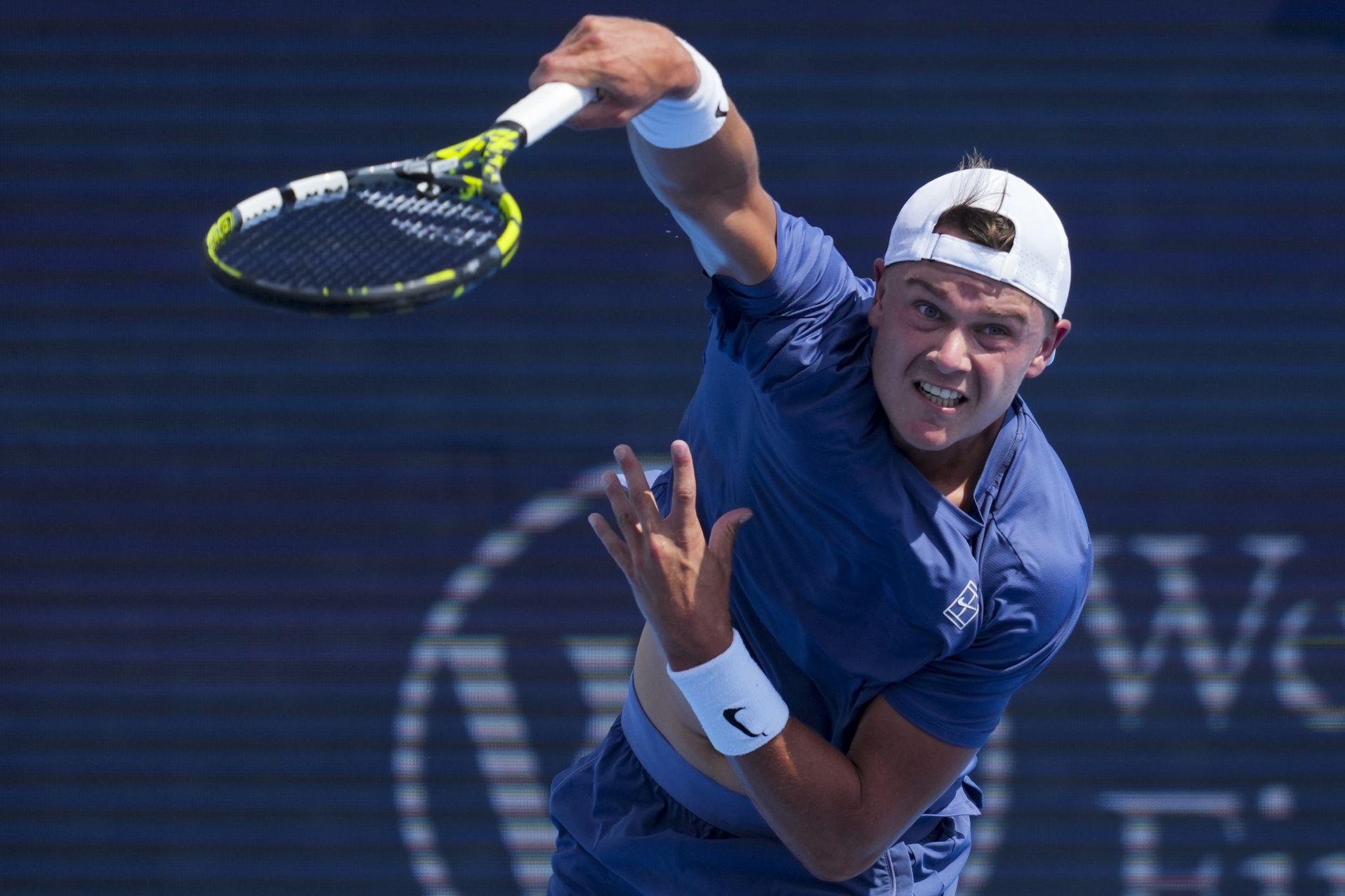 Holger Rune (DEN) serves against Frances Tiafoe (USA) during the Cincinnati Open at the Lindner Family Tennis Center.