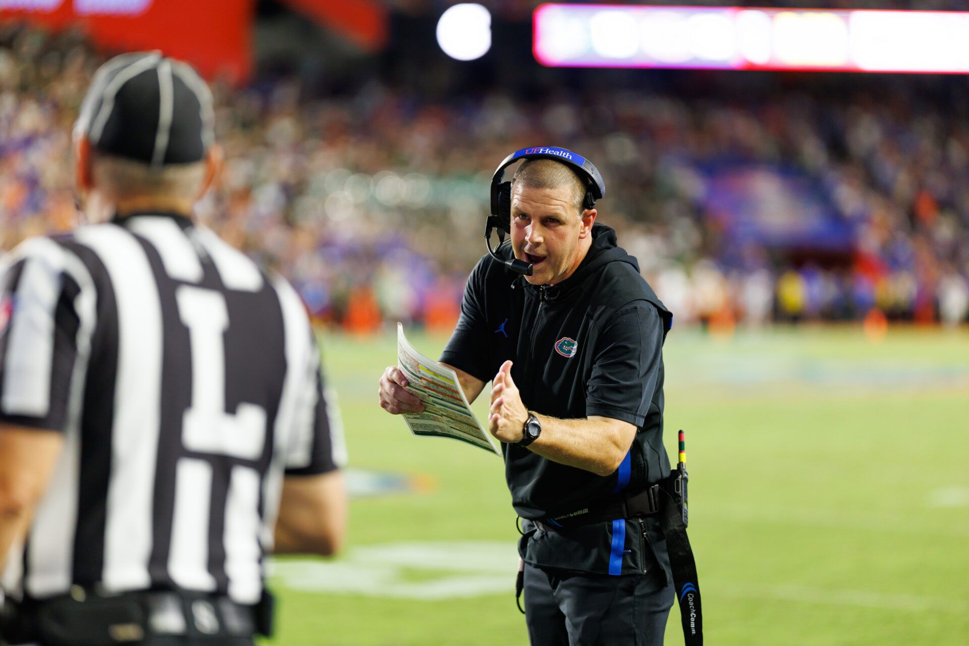 Florida Gators head coach Billy Napier calls a timeout against the Florida Gators during the second half at Ben Hill Griffin Stadium.