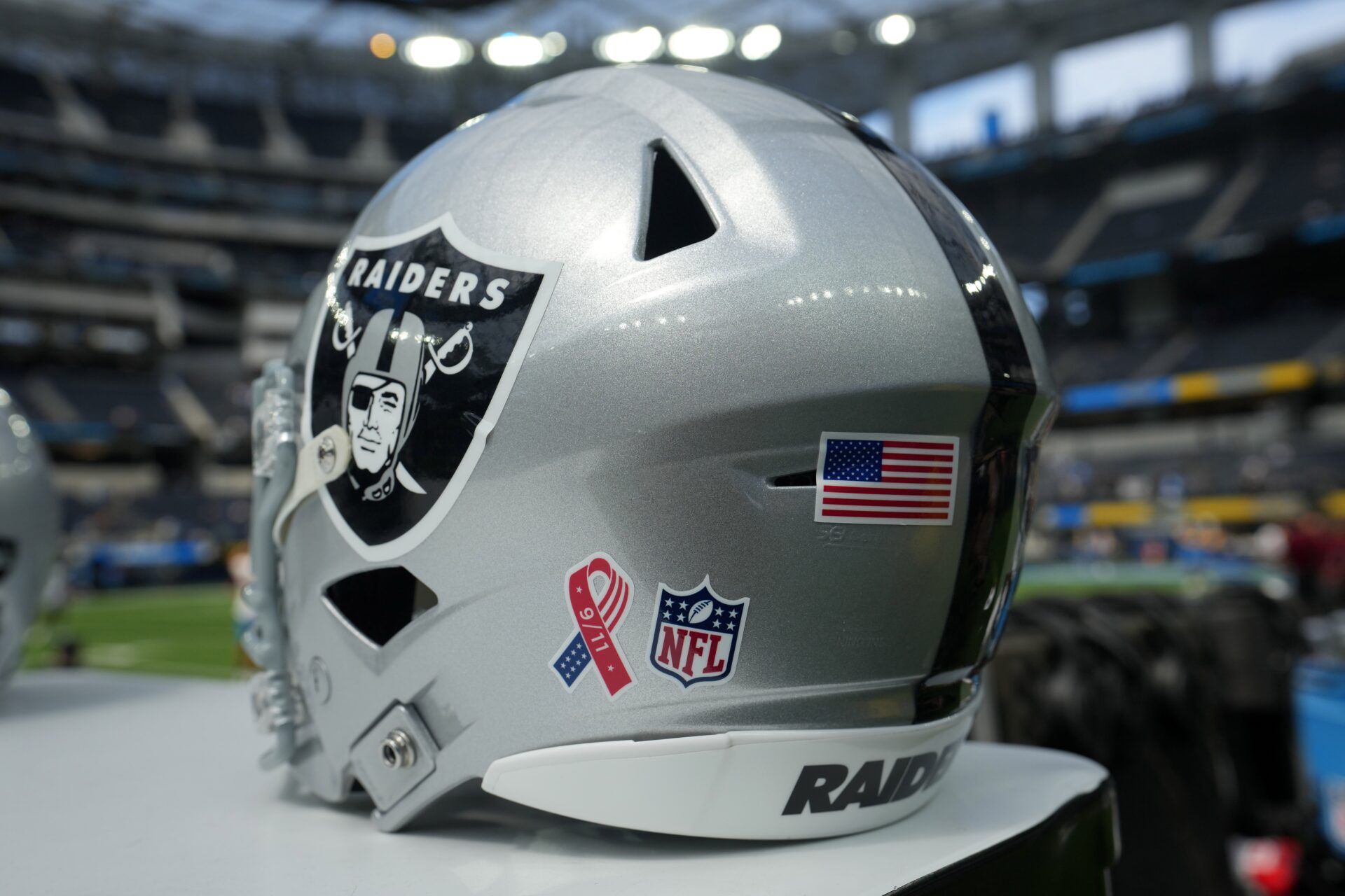 A detailed view of NFL 9-11 logo on a Las Vegas Raiders helmet in the first half at SoFi Stadium.